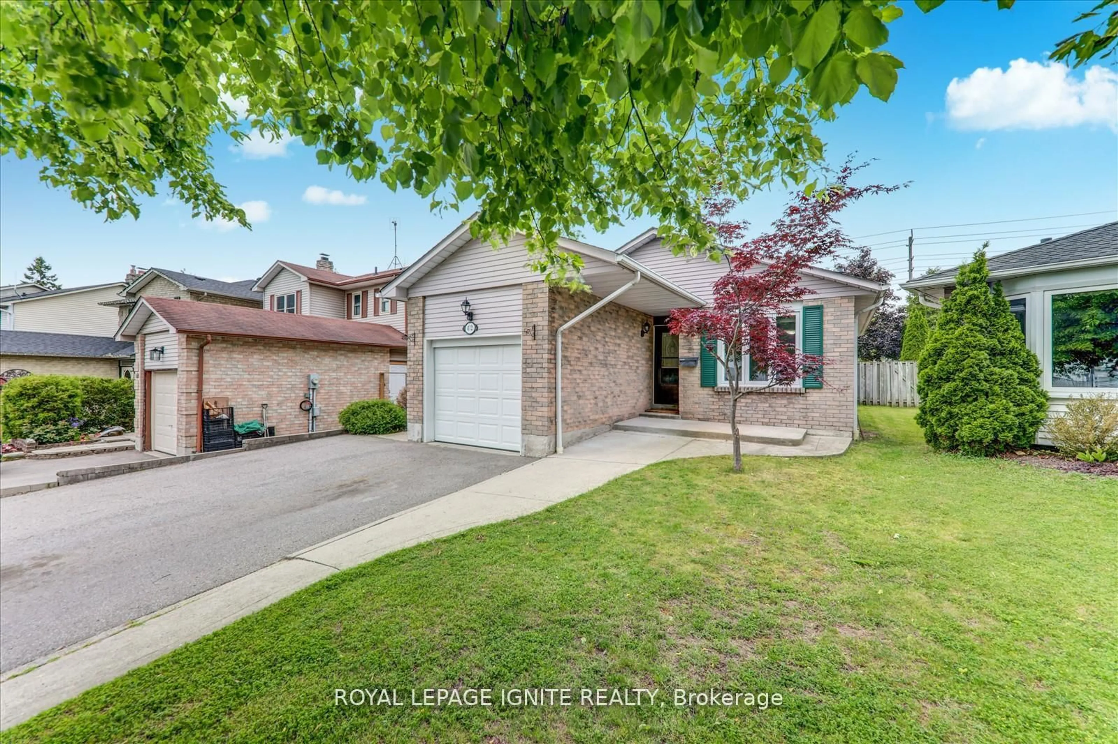 Home with brick exterior material, street for 412 Prince Of Wales Dr, Whitby Ontario L1N 6M9