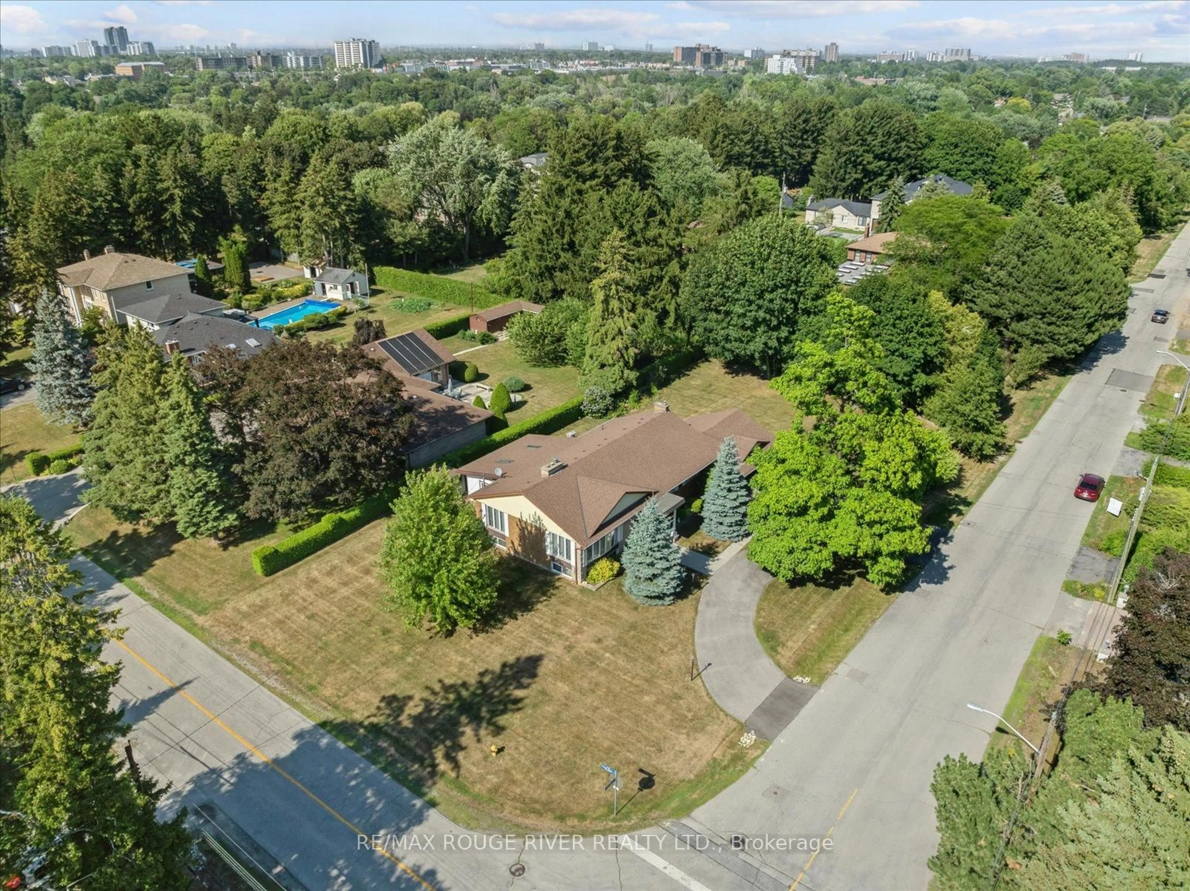 A pic from outside/outdoor area/front of a property/back of a property/a pic from drone, street for 71 Cedar Brae Blvd, Toronto Ontario M1J 2K7