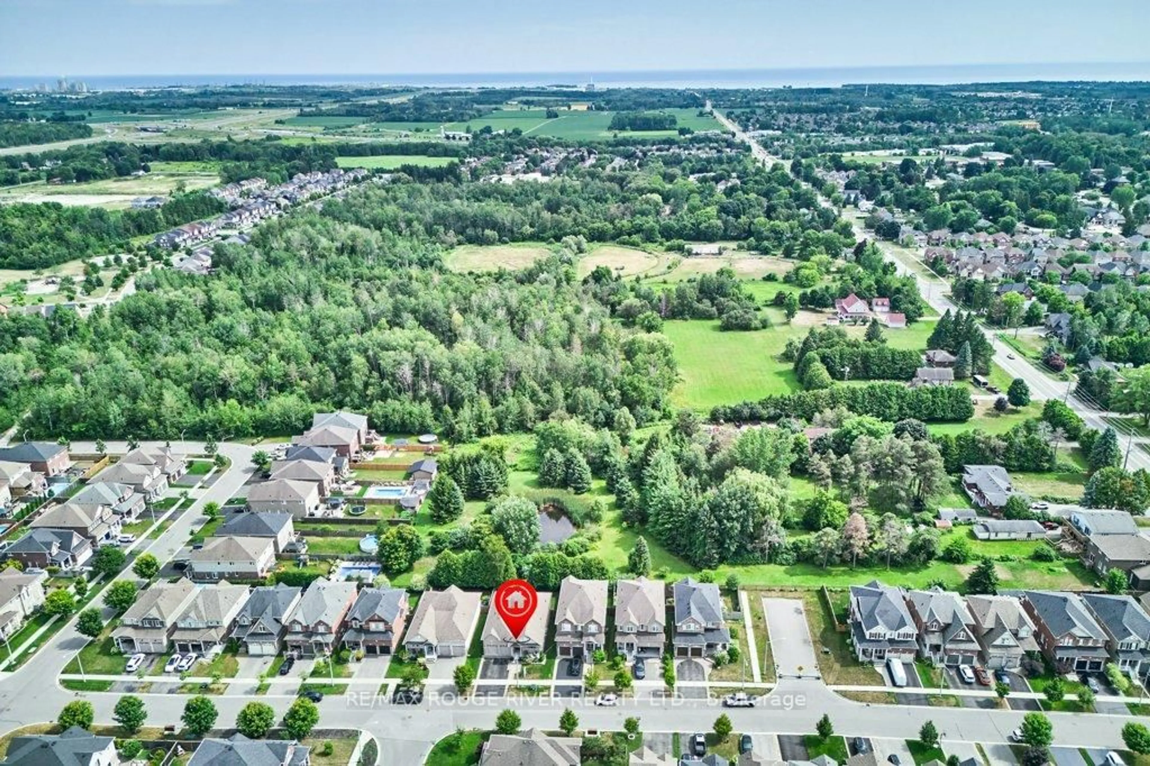 A pic from outside/outdoor area/front of a property/back of a property/a pic from drone, water/lake/river/ocean view for 51 Elmer Adams Dr, Clarington Ontario L1E 0G5