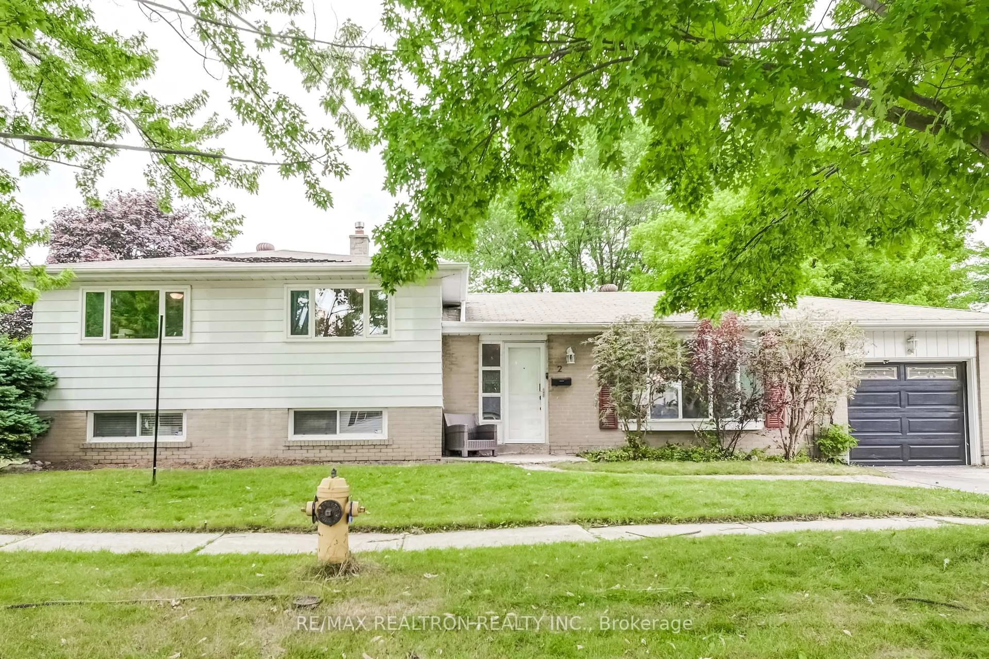 Home with vinyl exterior material, street for 2 Grovenest Dr, Toronto Ontario M1E 4J3