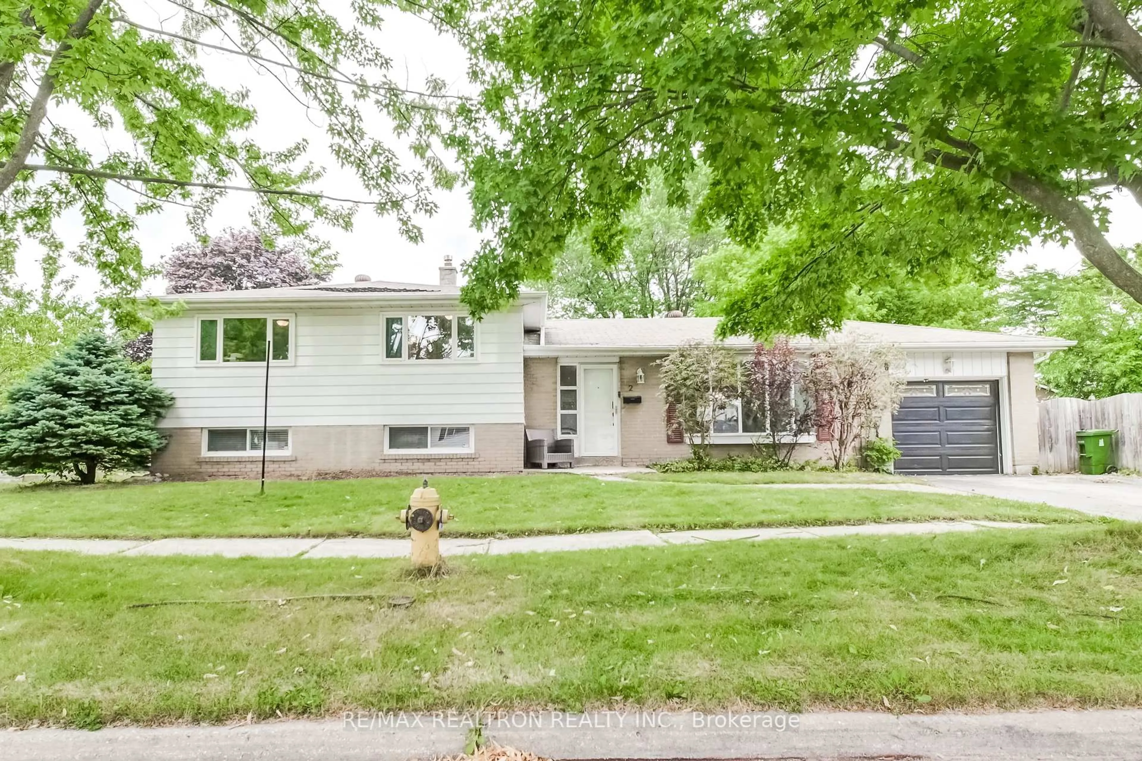 Home with vinyl exterior material, street for 2 Grovenest Dr, Toronto Ontario M1E 4J3