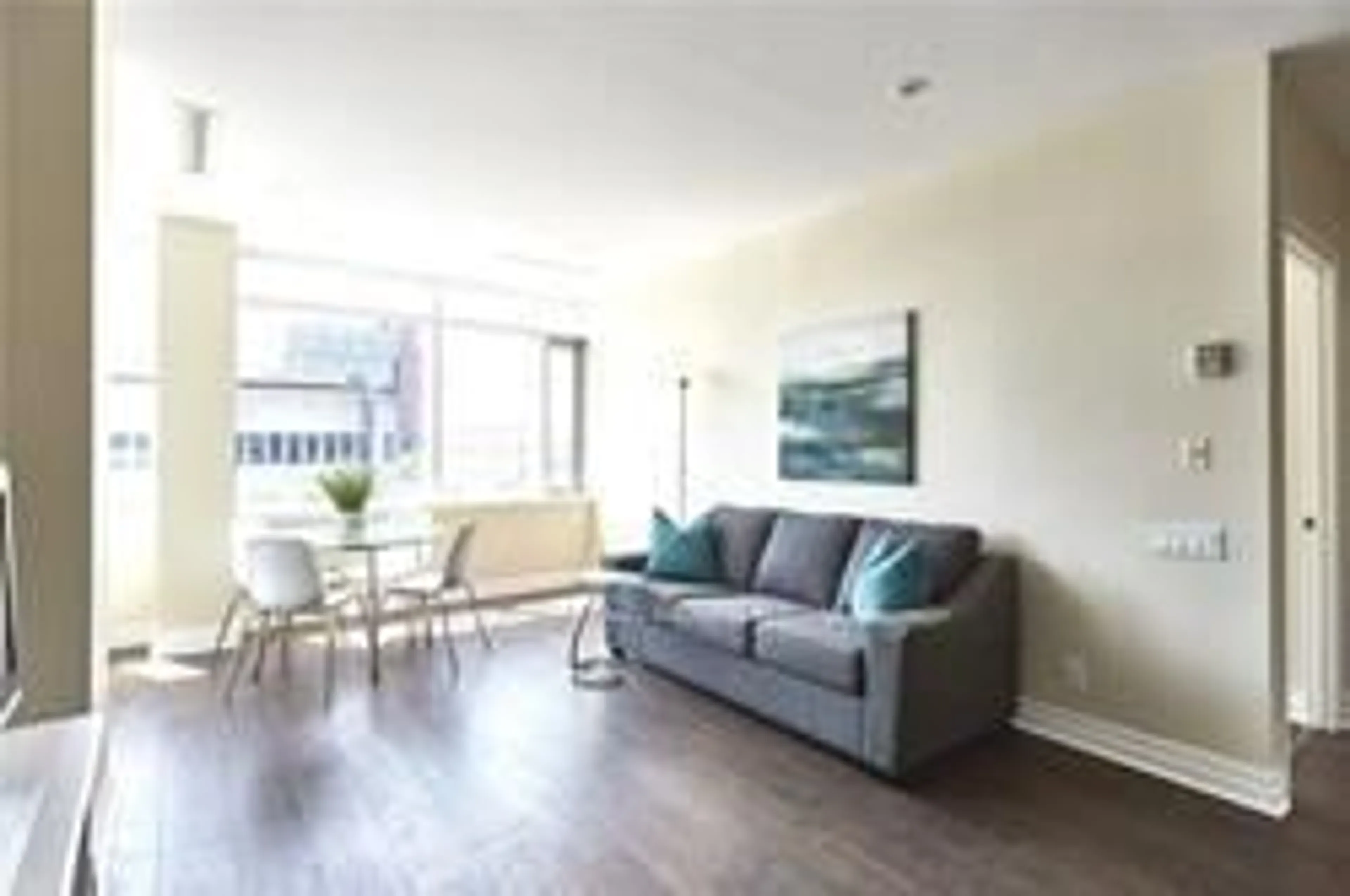 Living room with furniture, wood/laminate floor for 44 Bond St #314, Oshawa Ontario L1G 6R2