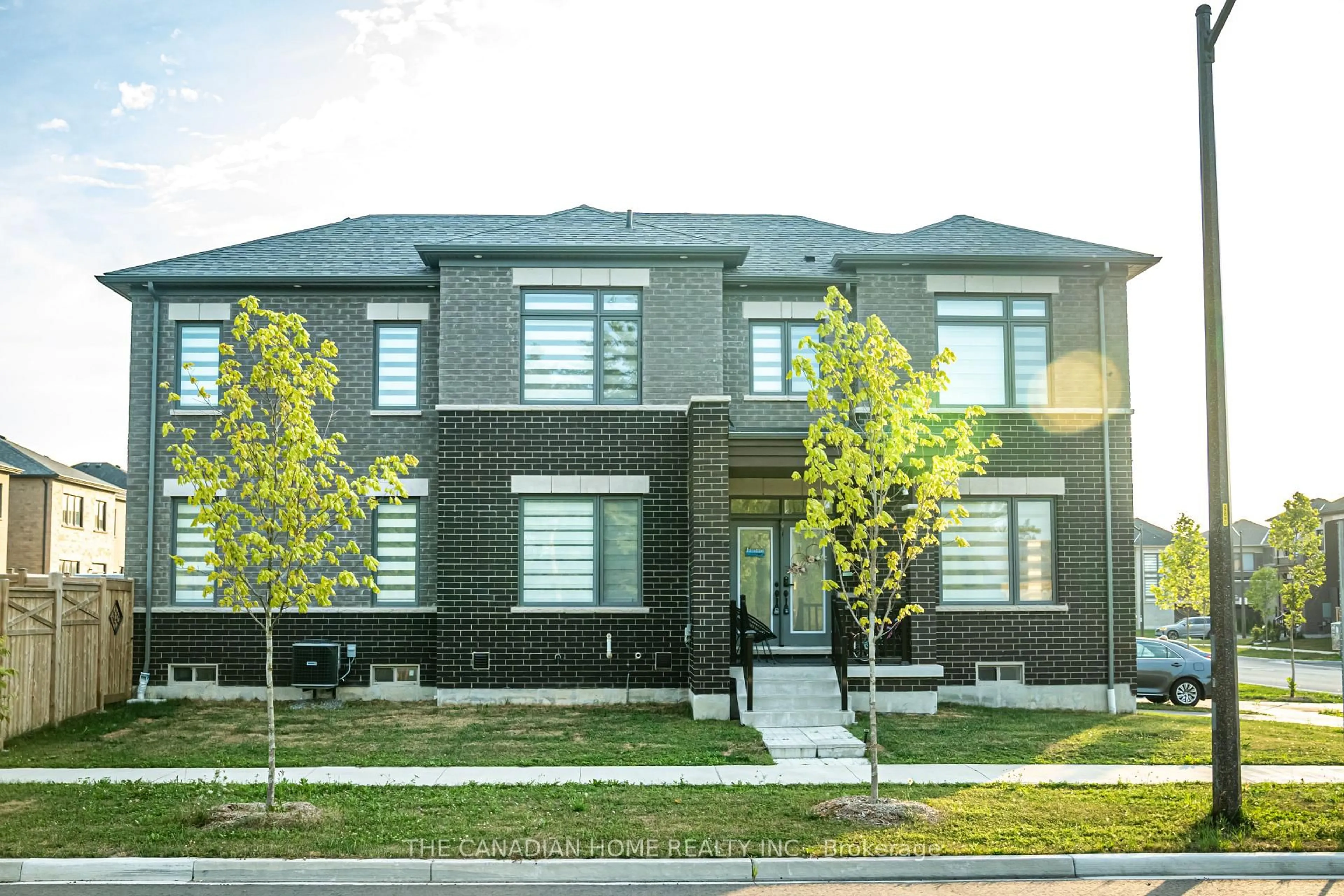 Home with brick exterior material, street for 135 Micklefield Ave, Whitby Ontario L1P 0L3