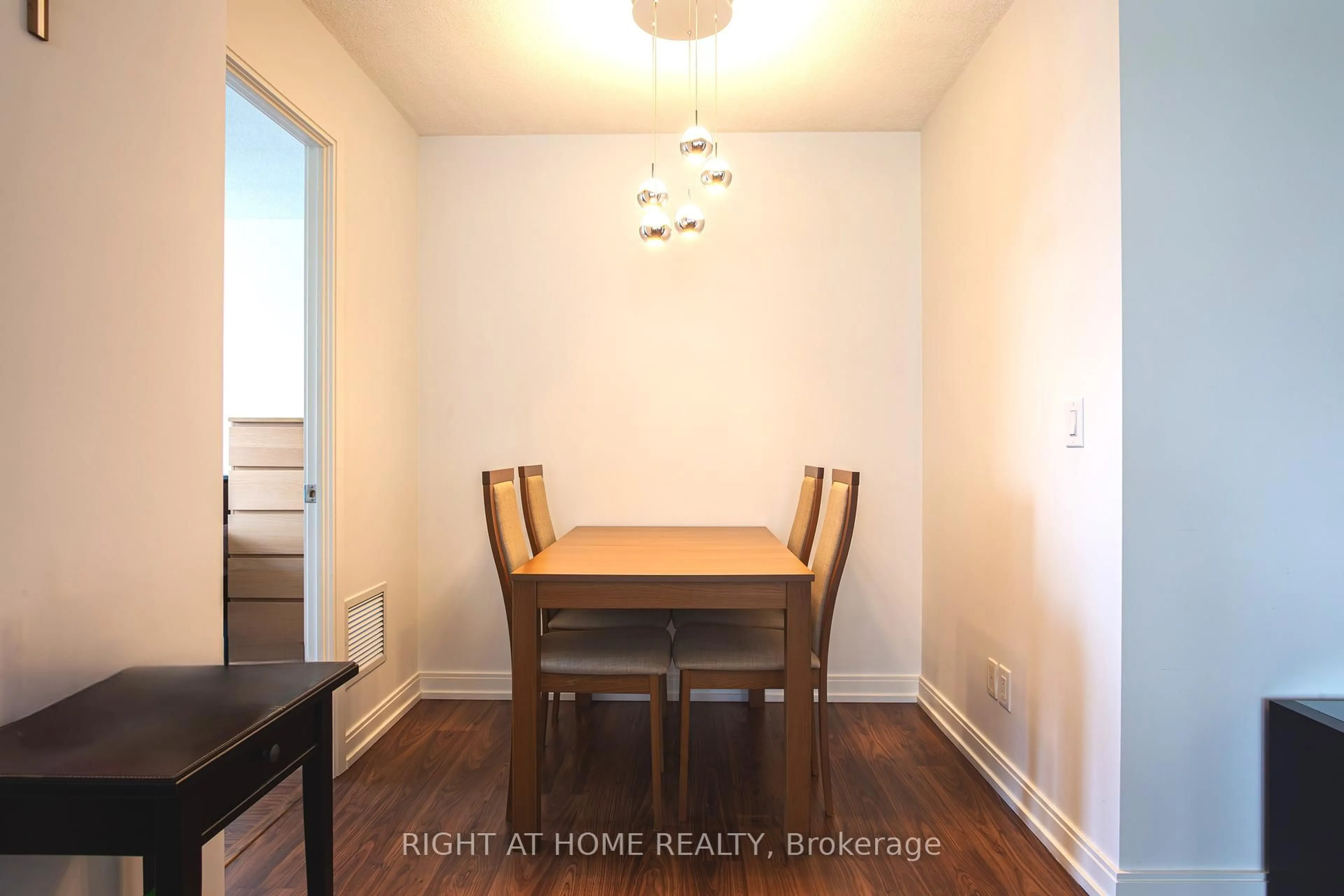 Dining room, wood/laminate floor for 151 Village Green Sq #908, Toronto Ontario M1S 0K5