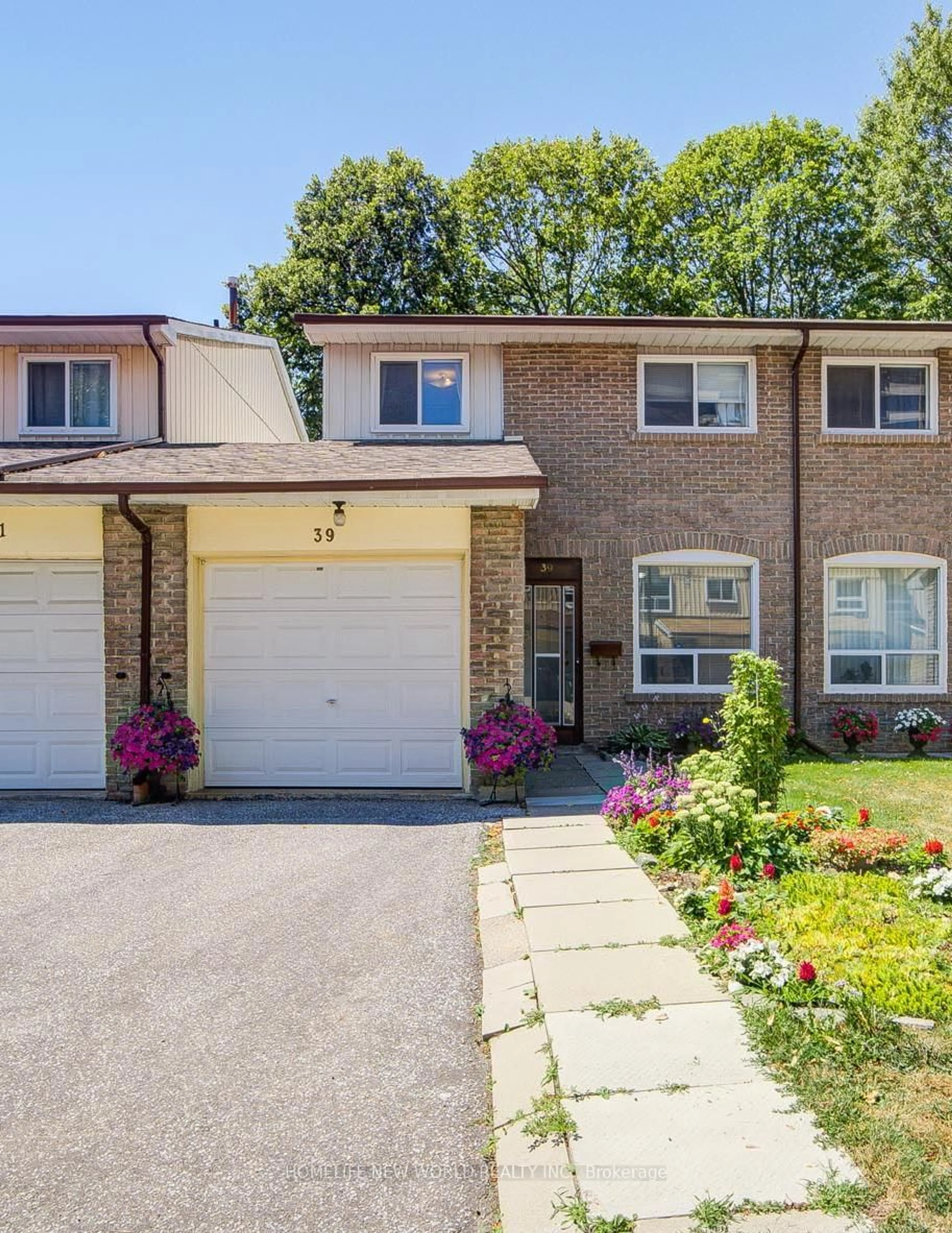 Home with brick exterior material, street for 44 Chester Le Blvd #39, Toronto Ontario M1W 2M8