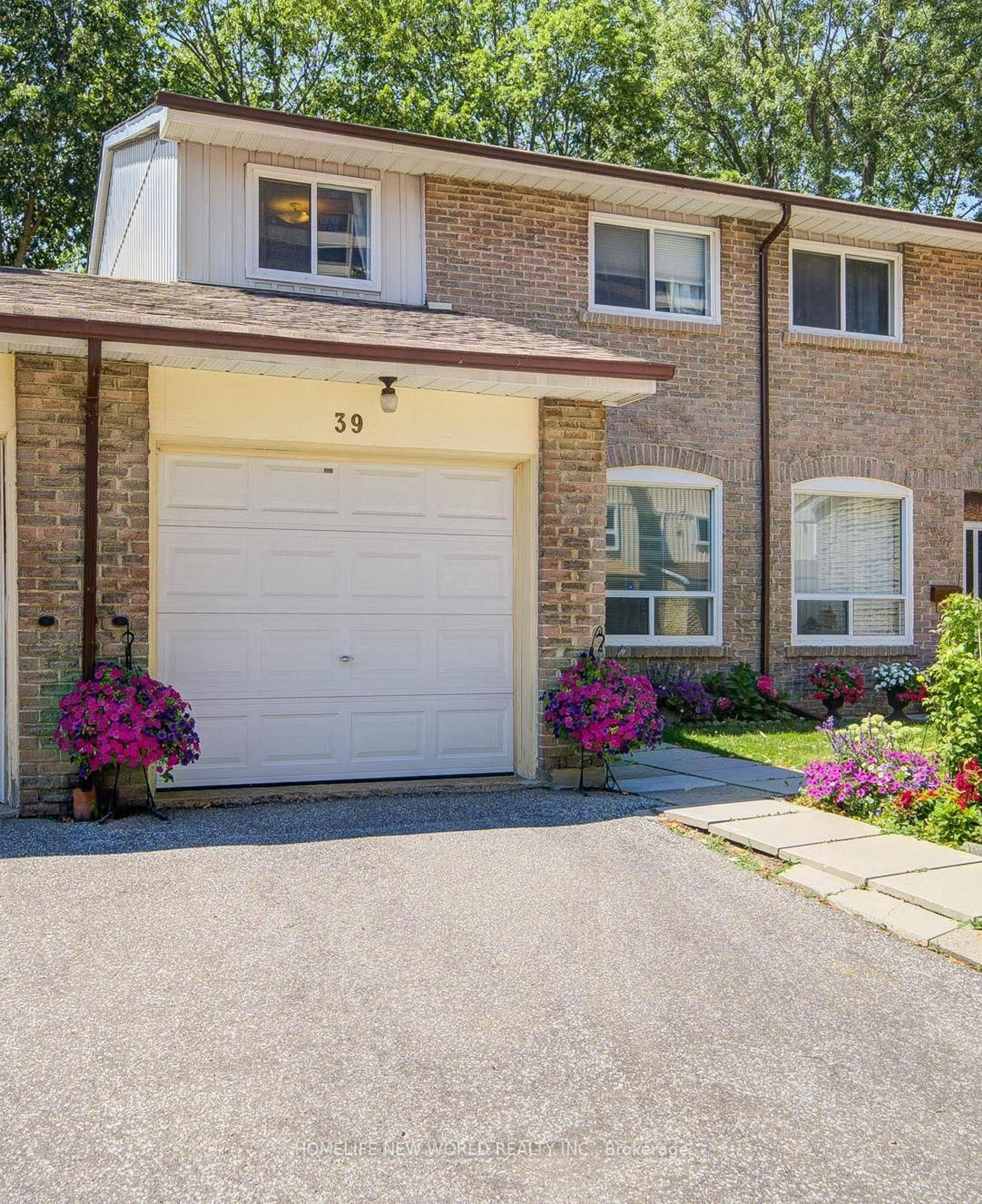 Home with brick exterior material, street for 44 Chester Le Blvd #39, Toronto Ontario M1W 2M8