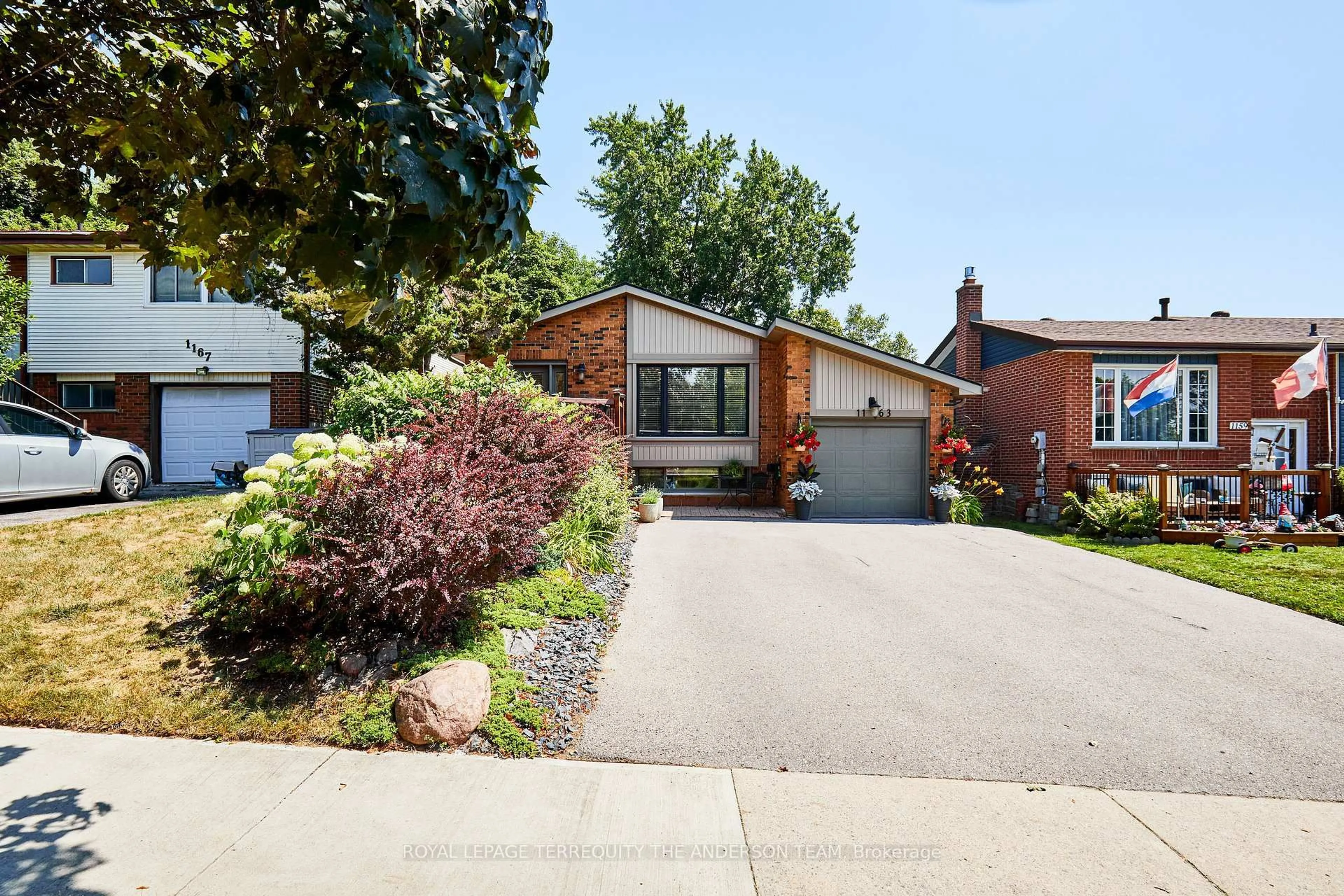 Home with brick exterior material, street for 1163 Cherrydown Dr, Oshawa Ontario L1H 7T3