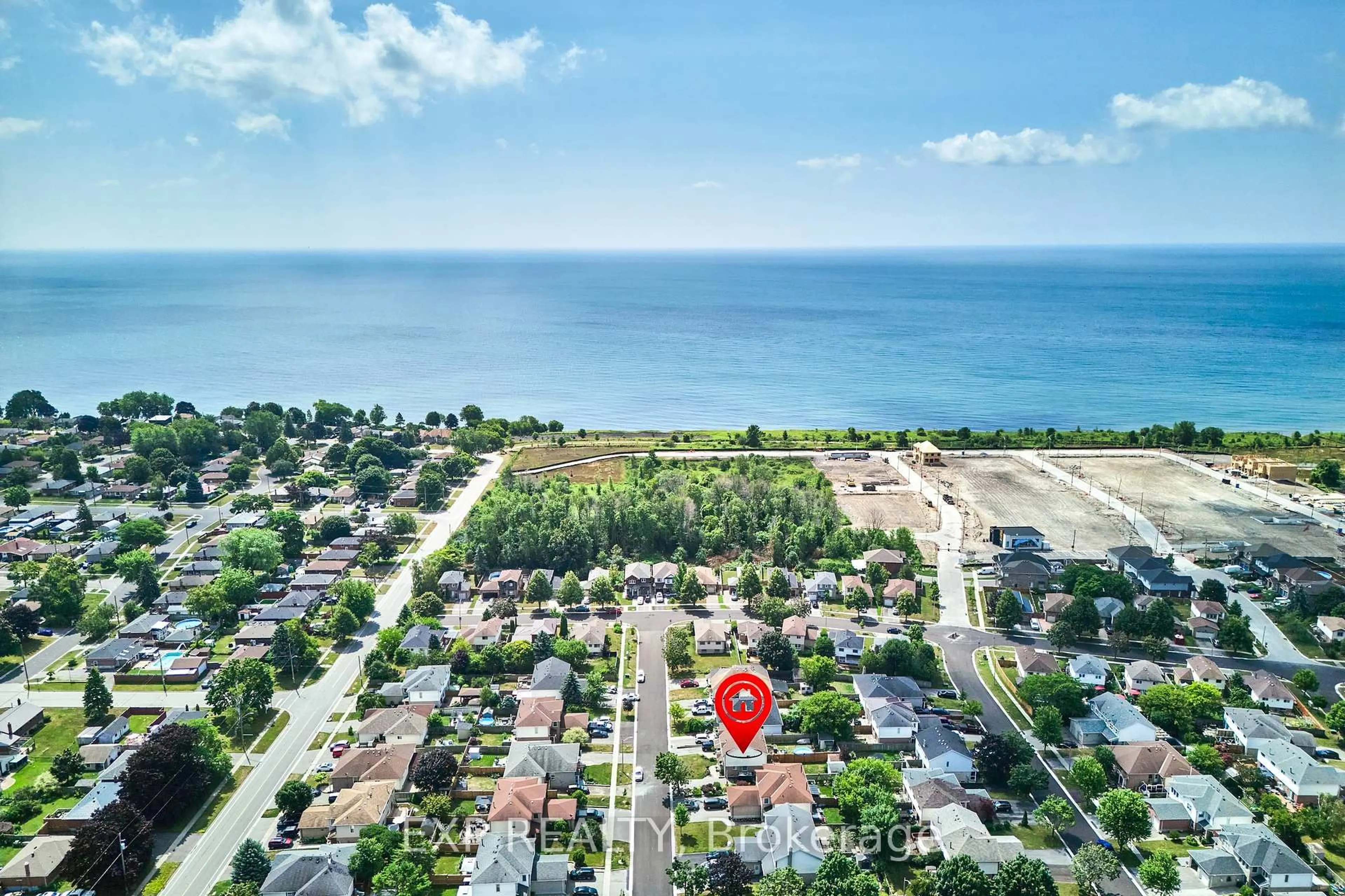 A pic from outside/outdoor area/front of a property/back of a property/a pic from drone, water/lake/river/ocean view for 1386 Charter Cres, Oshawa Ontario L1J 8K8