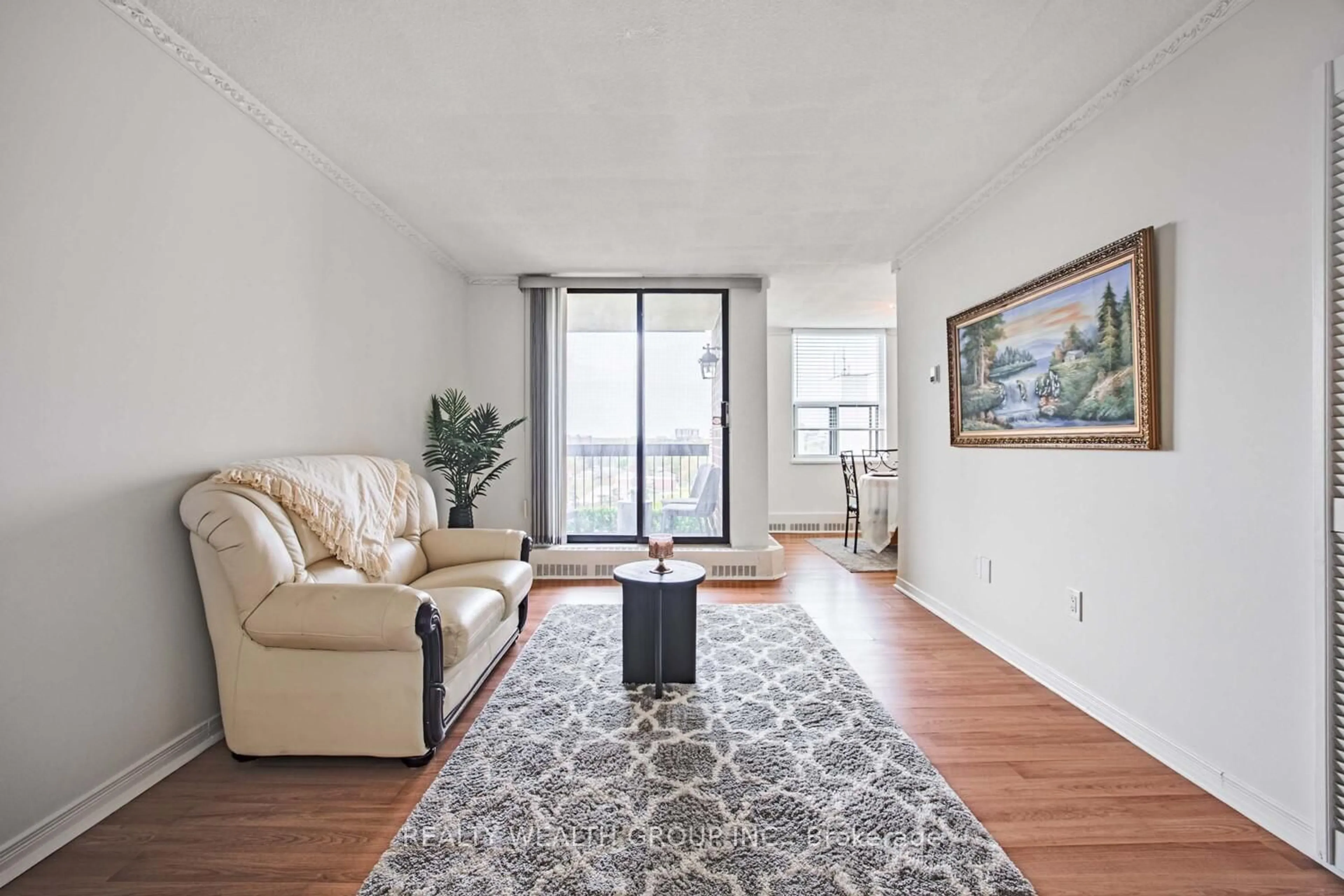 Living room with furniture, unknown for 90 Ling Rd ##1105, Toronto Ontario M1E 4Y3
