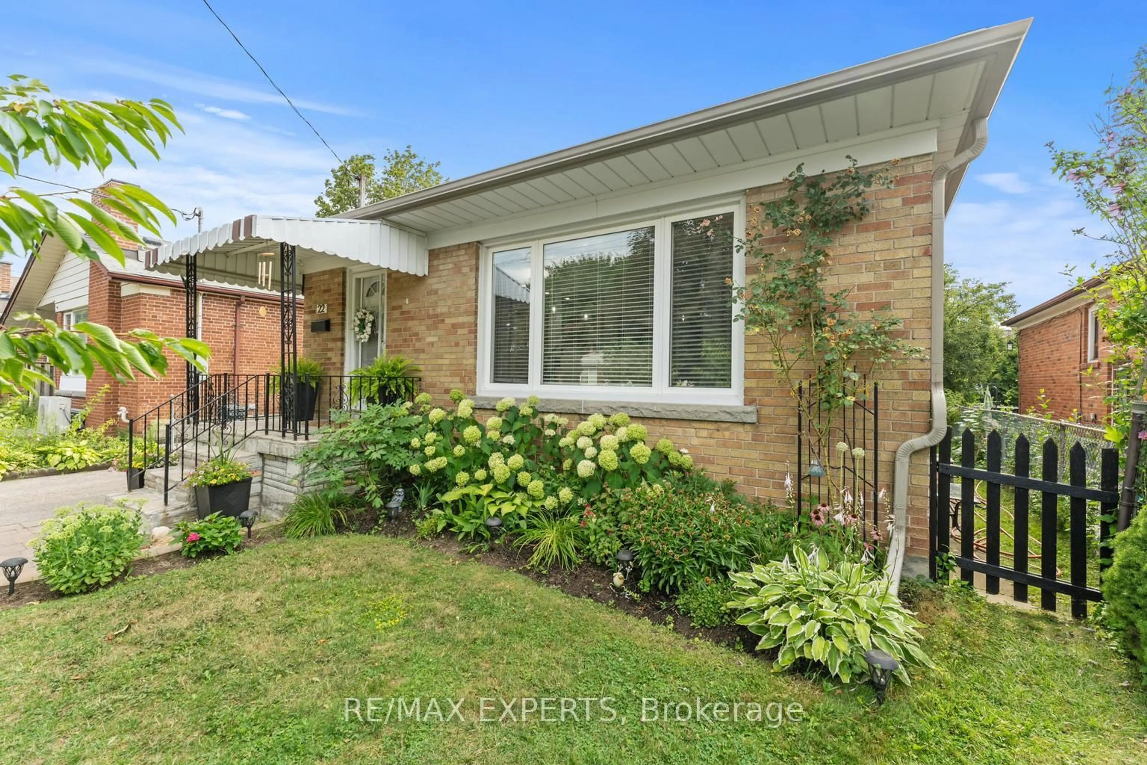Home with brick exterior material, street for 22 Beacon Rd, Toronto Ontario M1P 1G7