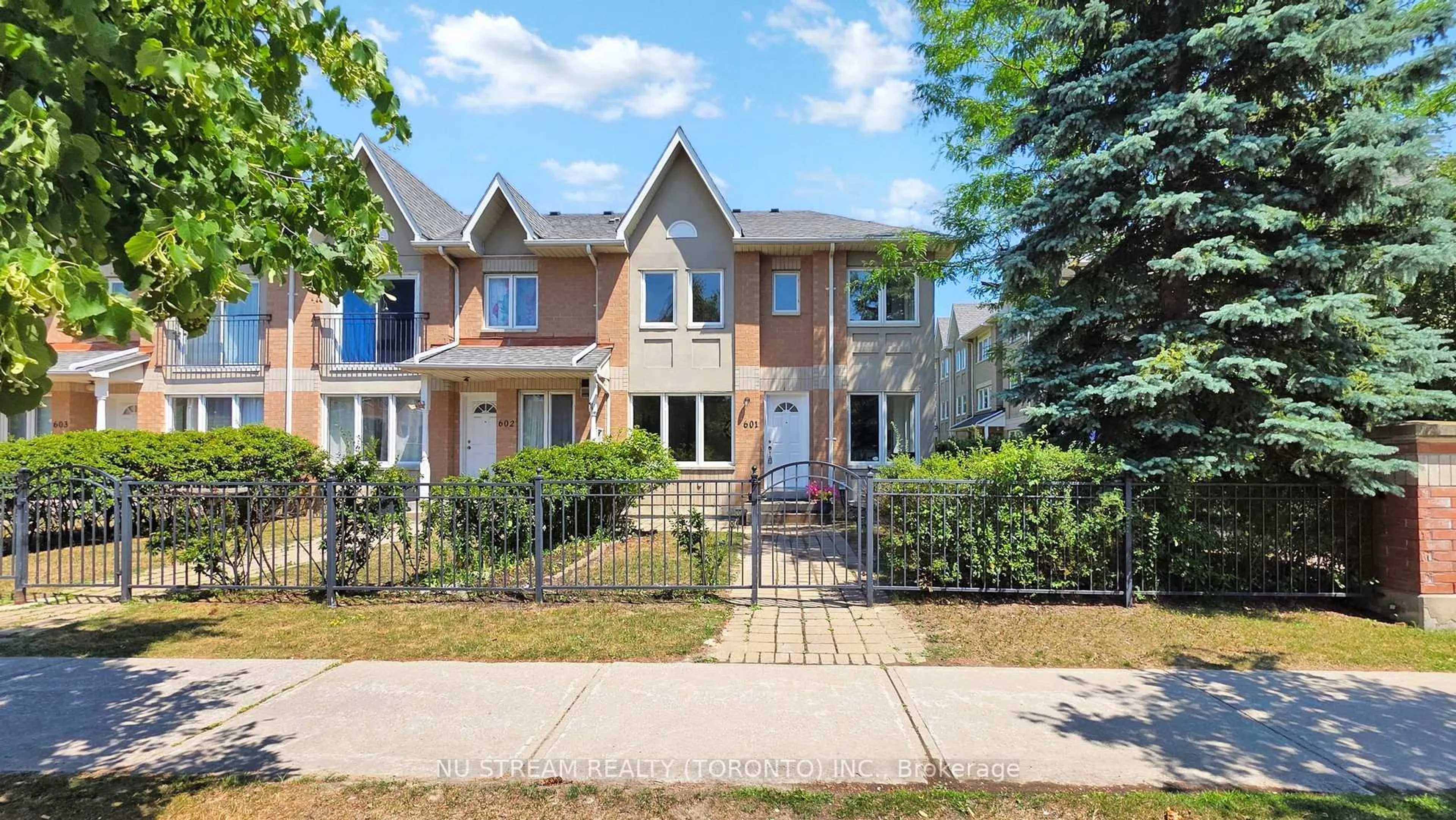 Home with brick exterior material, street for 29 Rosebank Dr #601, Toronto Ontario M1B 5Y7
