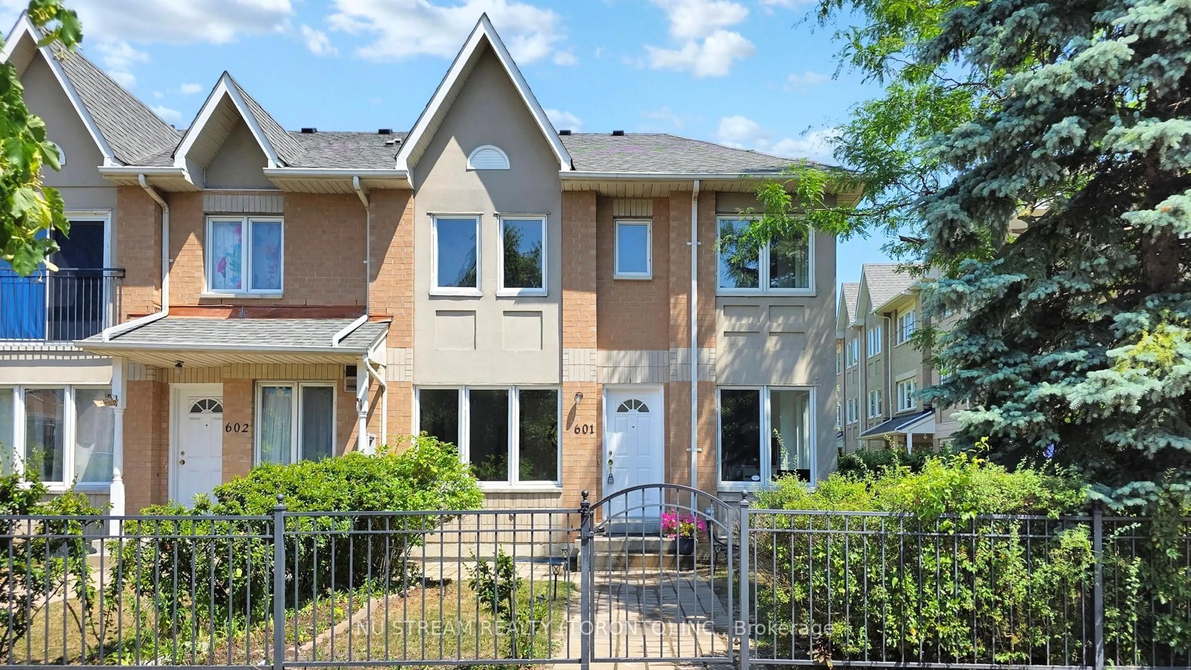 Home with brick exterior material, street for 29 Rosebank Dr #601, Toronto Ontario M1B 5Y7