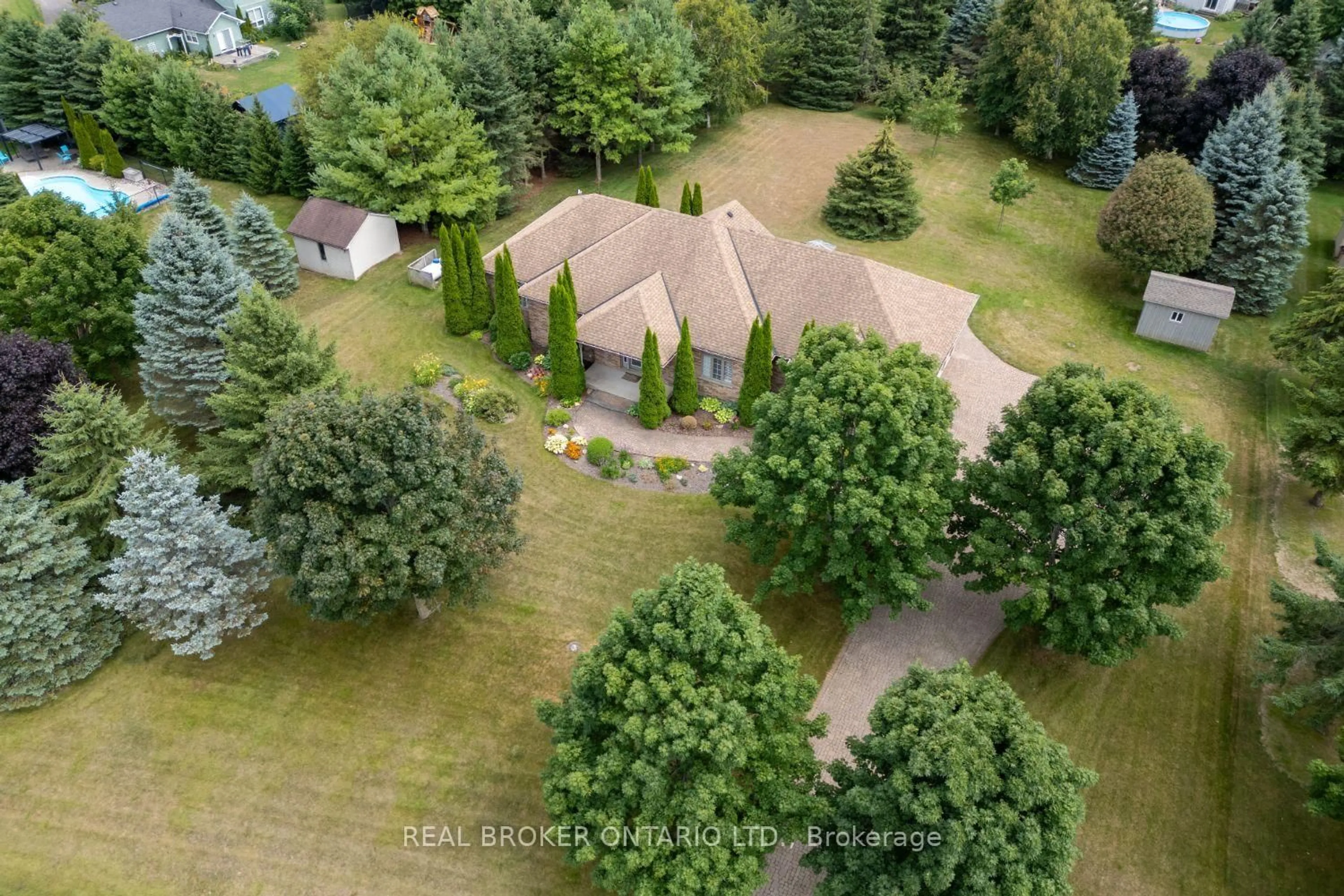 A pic from outside/outdoor area/front of a property/back of a property/a pic from drone, forest/trees view for 7 Virtue Crt, Clarington Ontario L0B 1J0