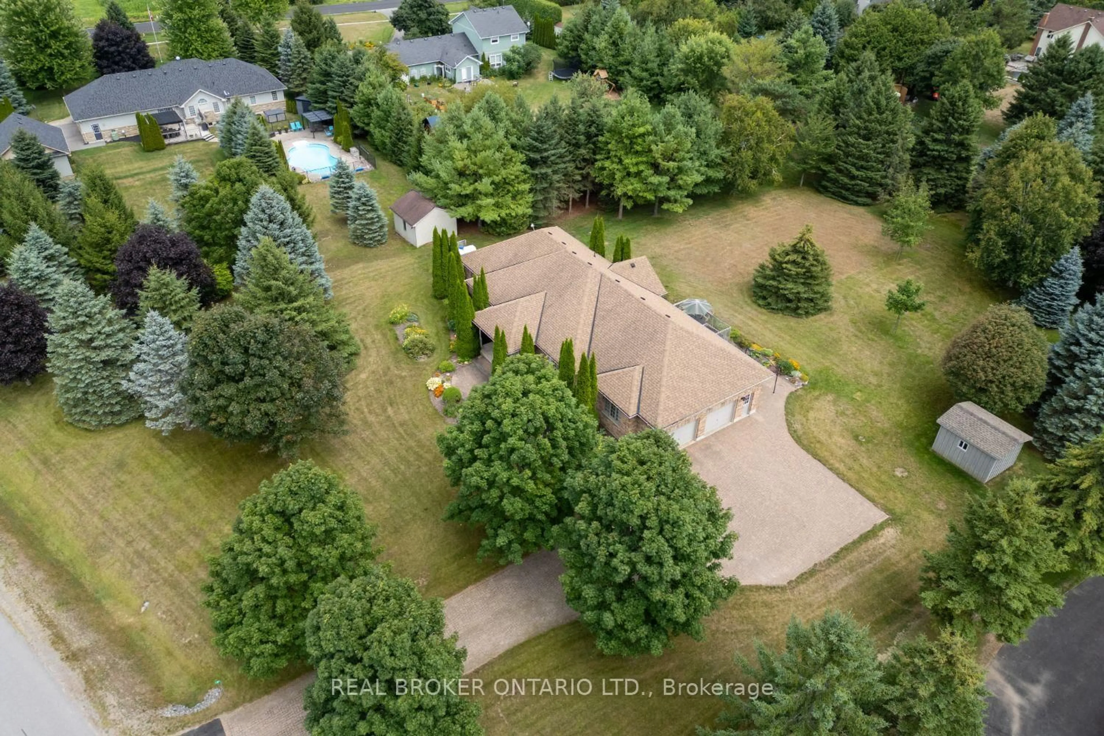 A pic from outside/outdoor area/front of a property/back of a property/a pic from drone, forest/trees view for 7 Virtue Crt, Clarington Ontario L0B 1J0