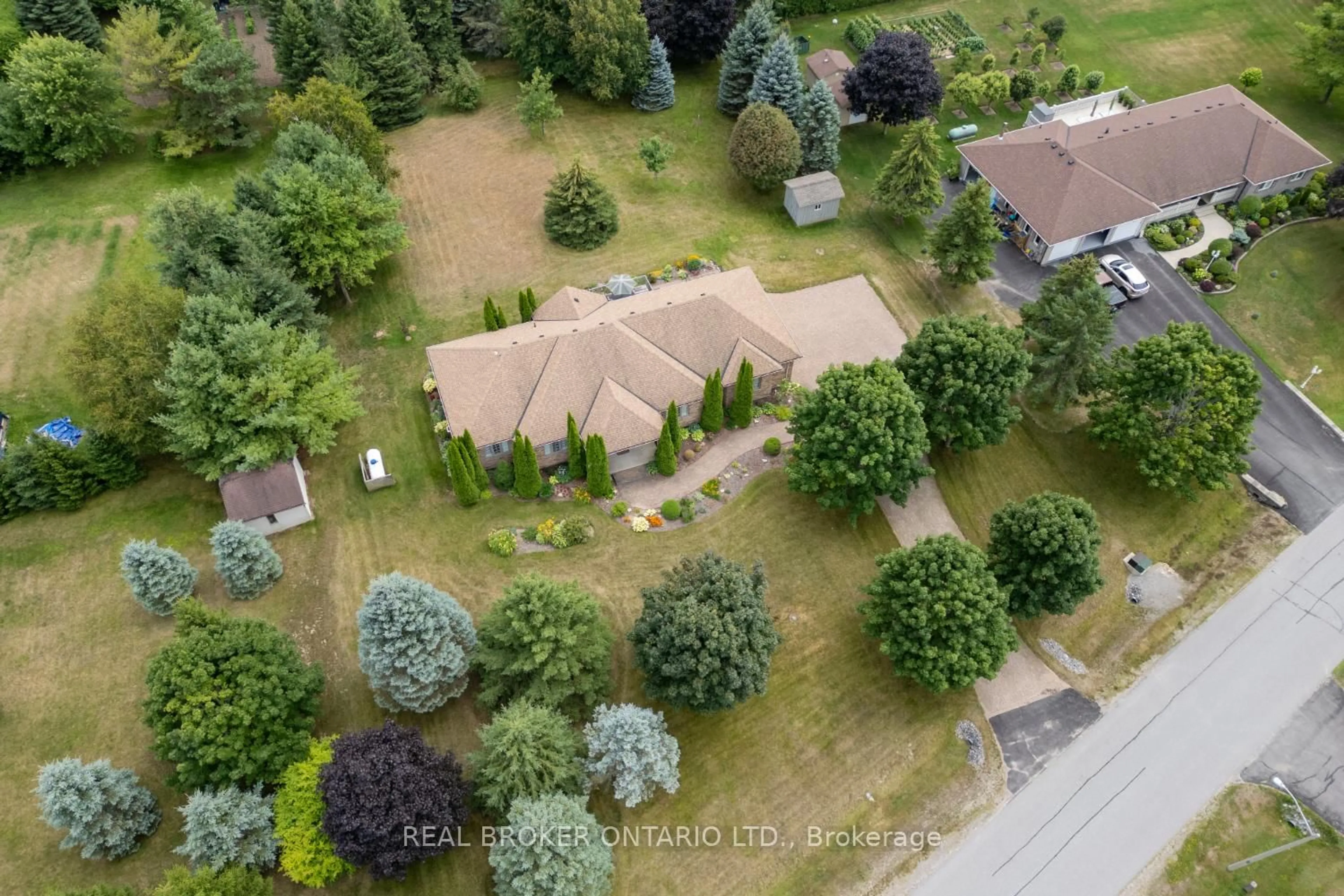 A pic from outside/outdoor area/front of a property/back of a property/a pic from drone, forest/trees view for 7 Virtue Crt, Clarington Ontario L0B 1J0