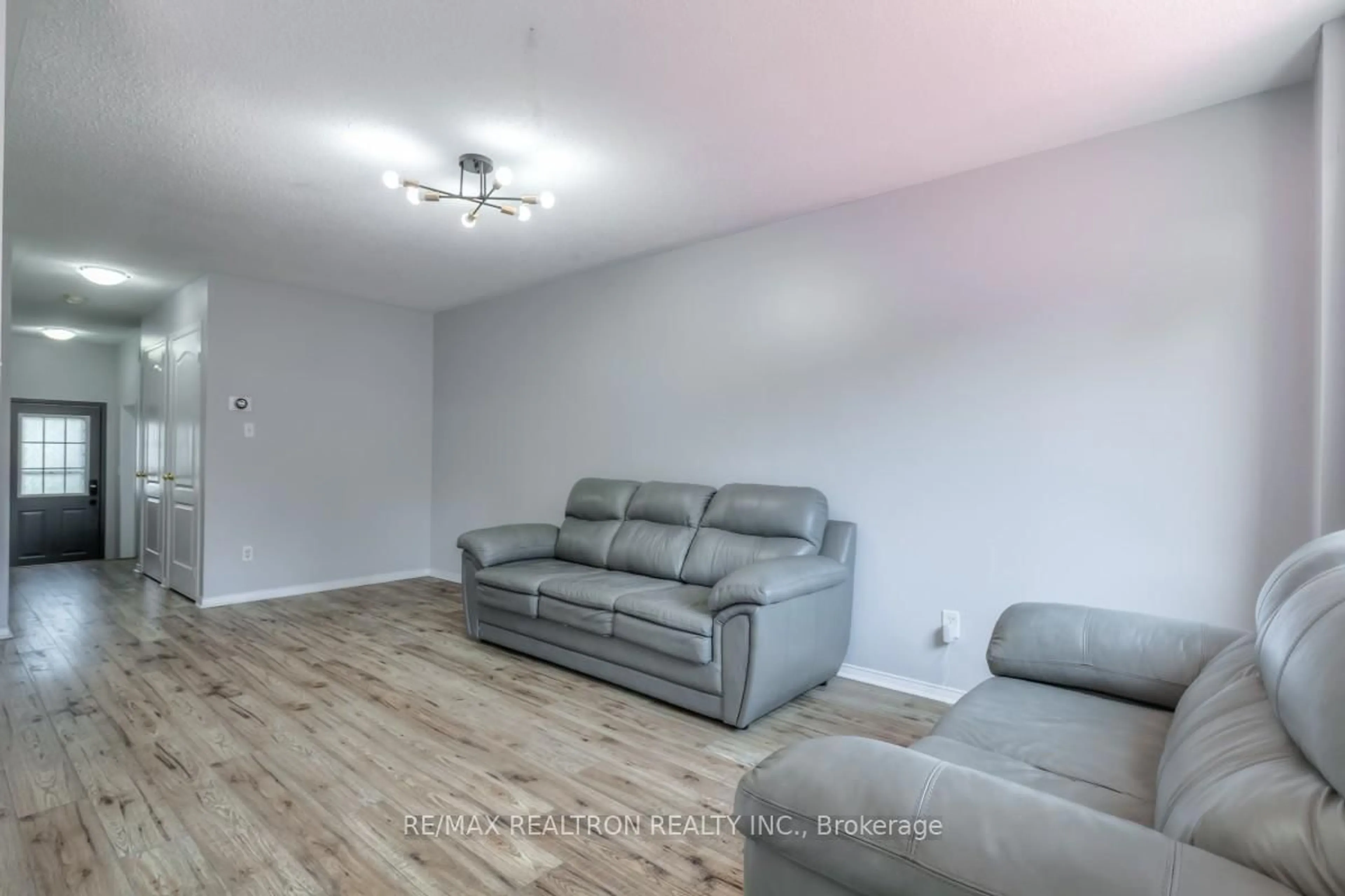 Living room with furniture, unknown for 9 Plantation Crt, Whitby Ontario L1P 1R2