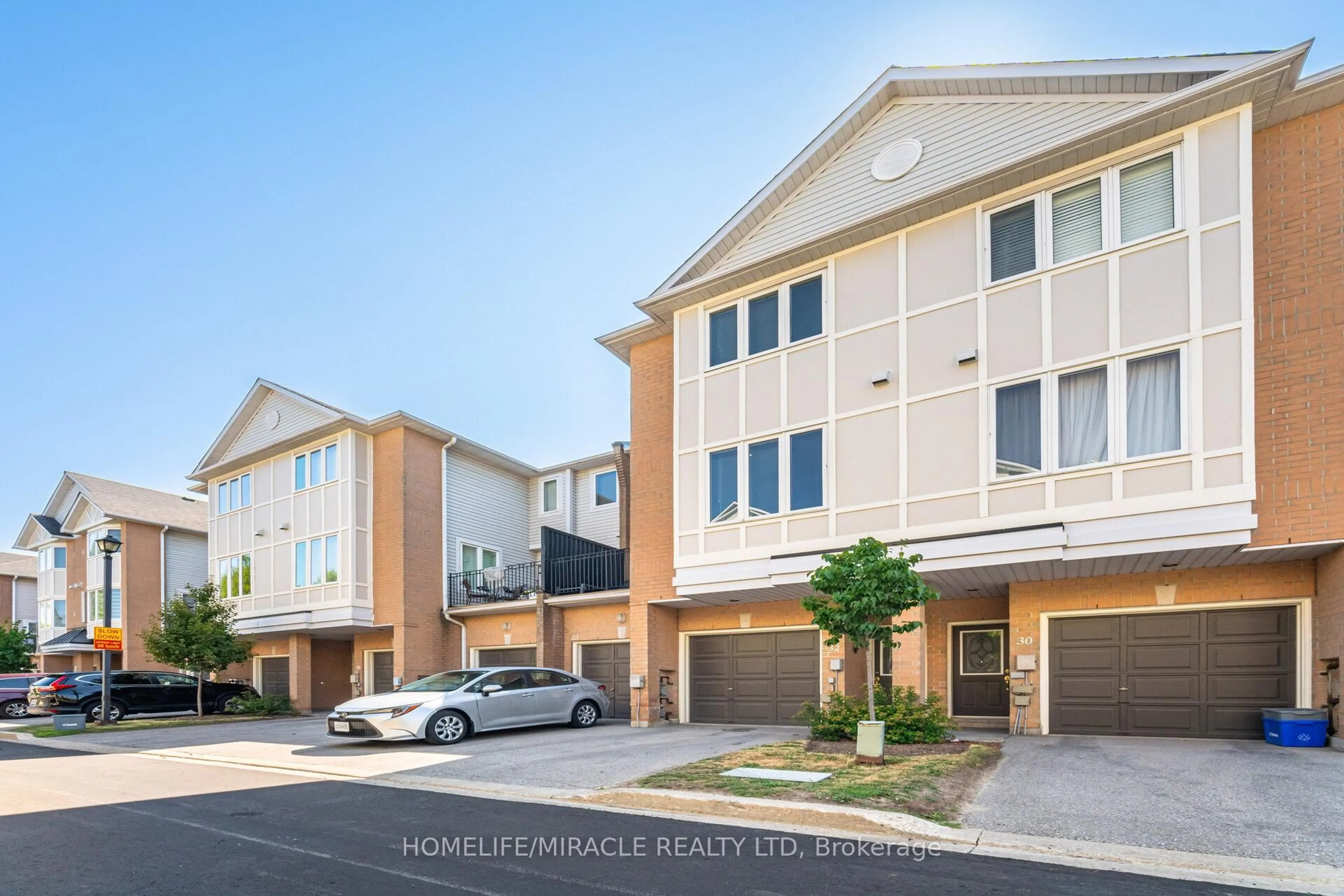 Home with vinyl exterior material, street for 83 Mondeo Dr #32, Toronto Ontario M1P 5B6