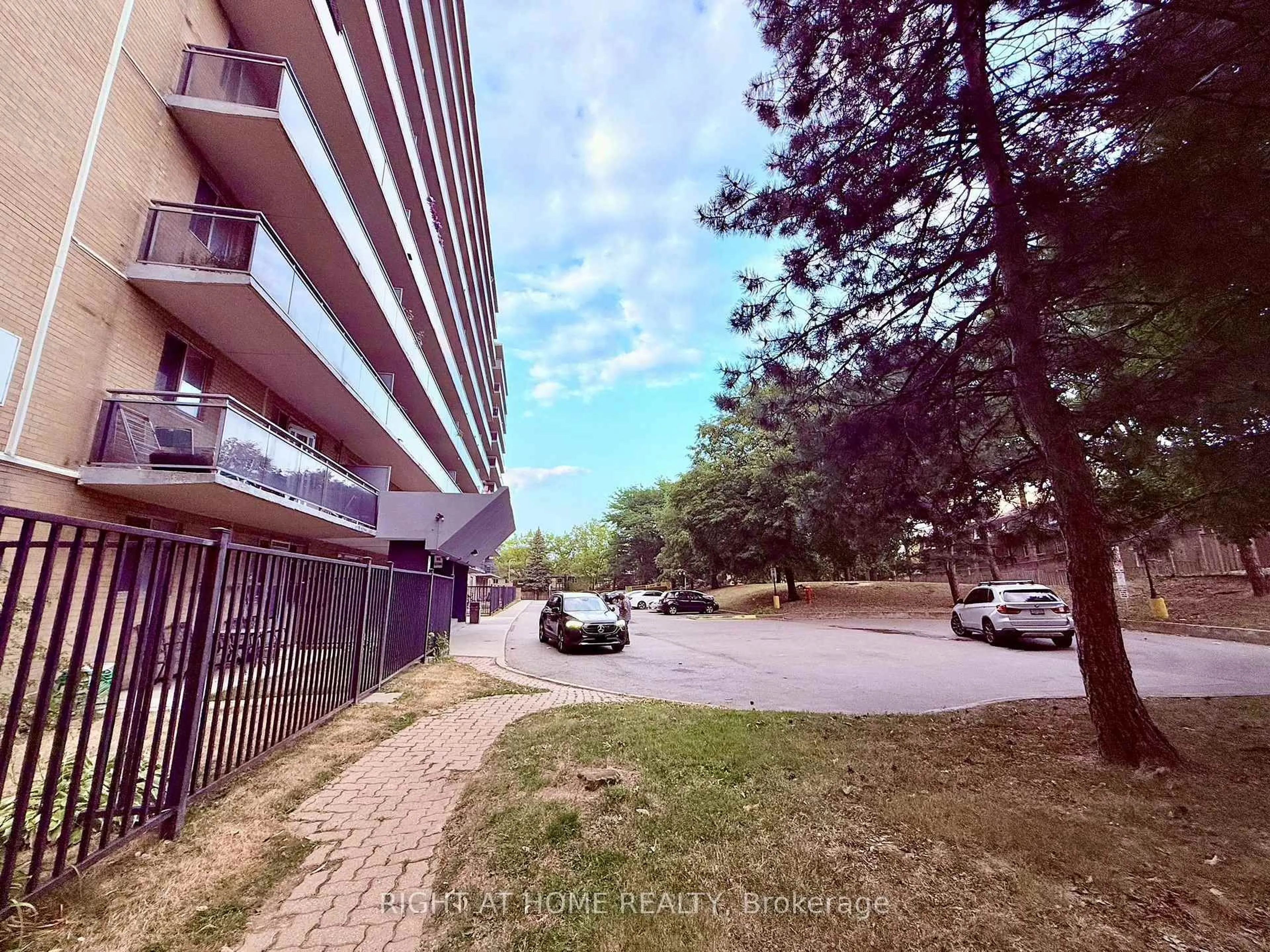 A pic from outside/outdoor area/front of a property/back of a property/a pic from drone, street for 100 Dundalk Dr #216, Toronto Ontario M1P 4V2