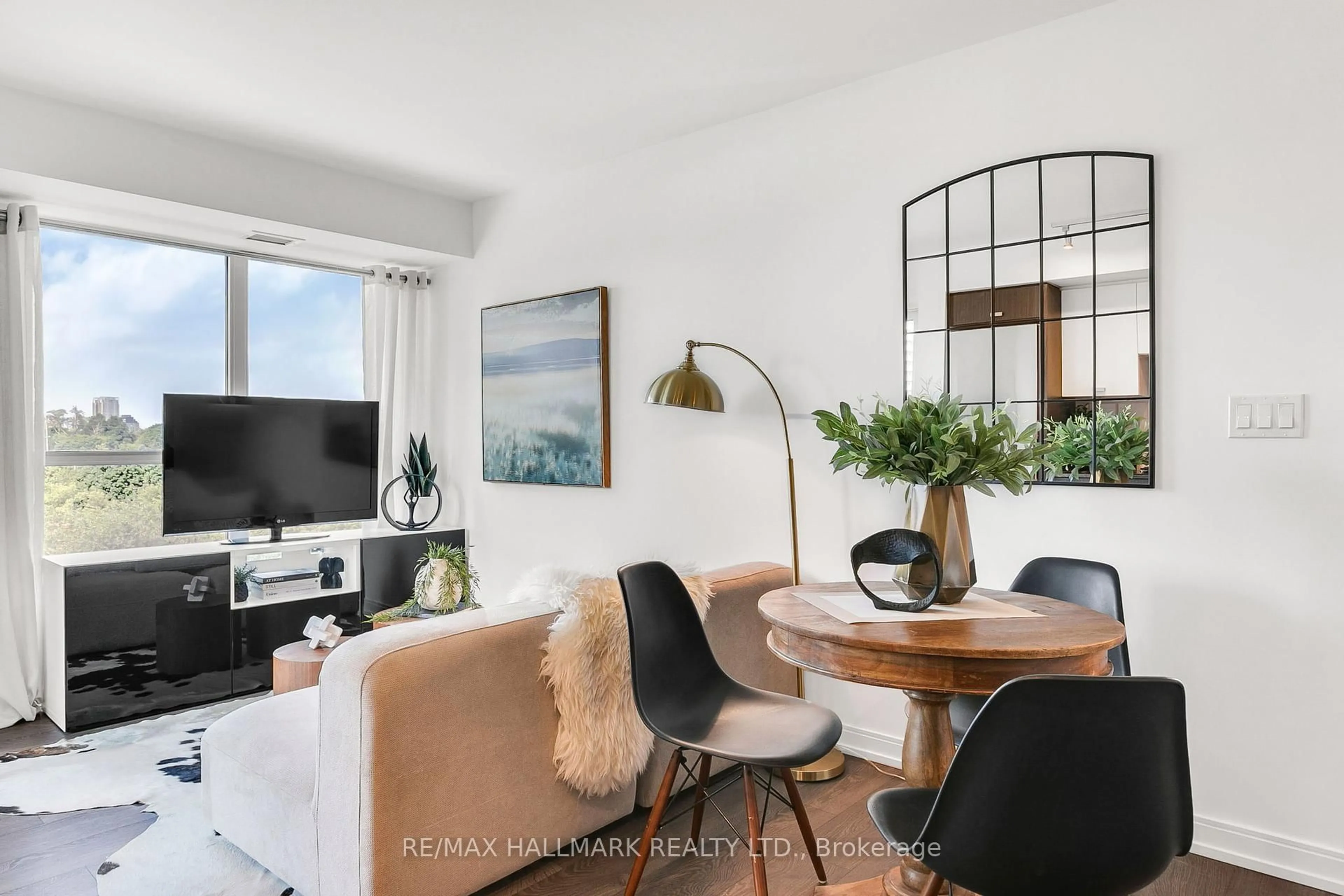 Living room with furniture, unknown for 275 Village Green Sq #522, Toronto Ontario M1S 0L8