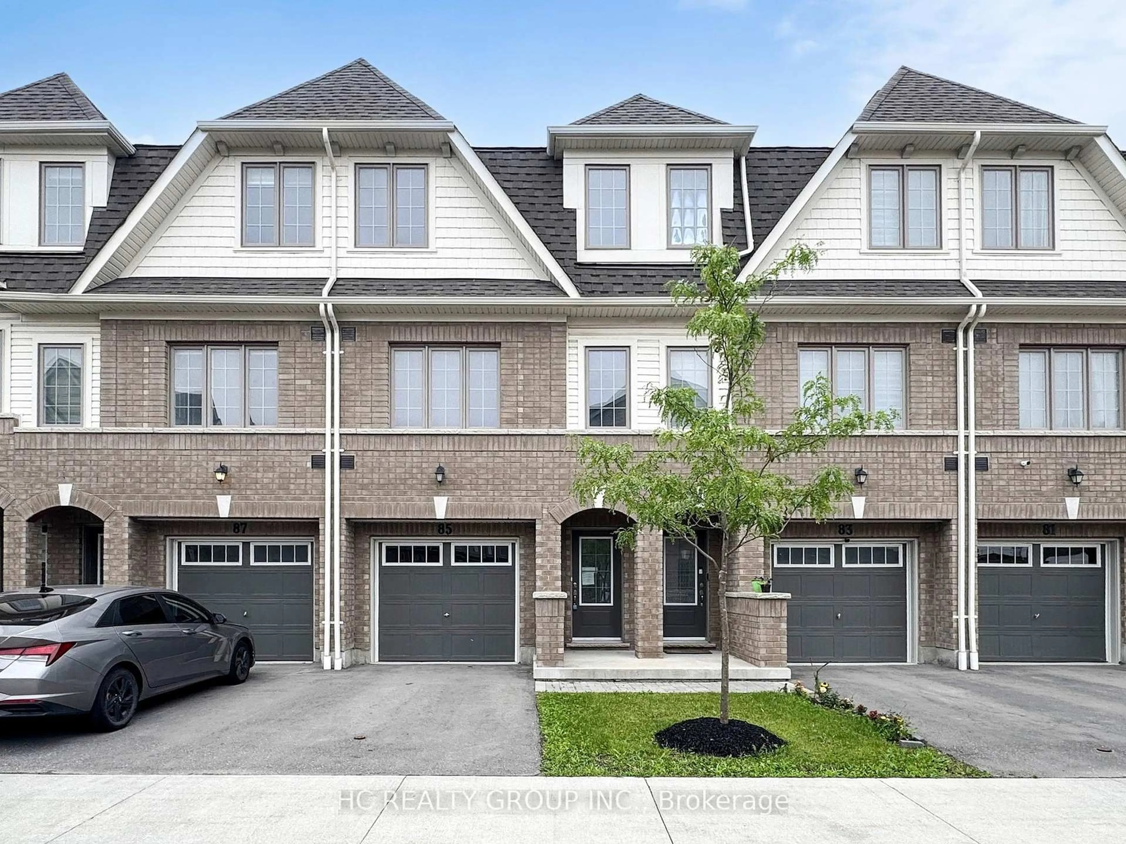 Home with brick exterior material, street for 85 Danzatore Path, Oshawa Ontario L1L 0P9
