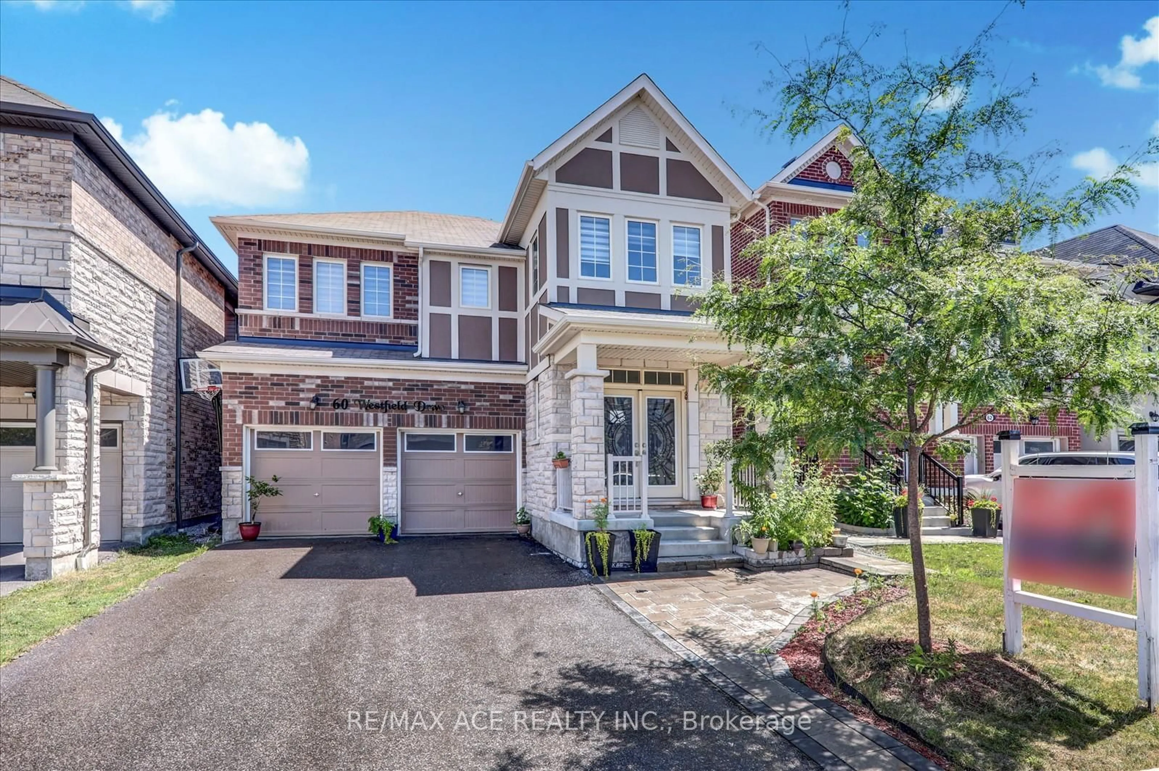 Home with brick exterior material, street for 60 Westfield Dr, Whitby Ontario L1P 0E9