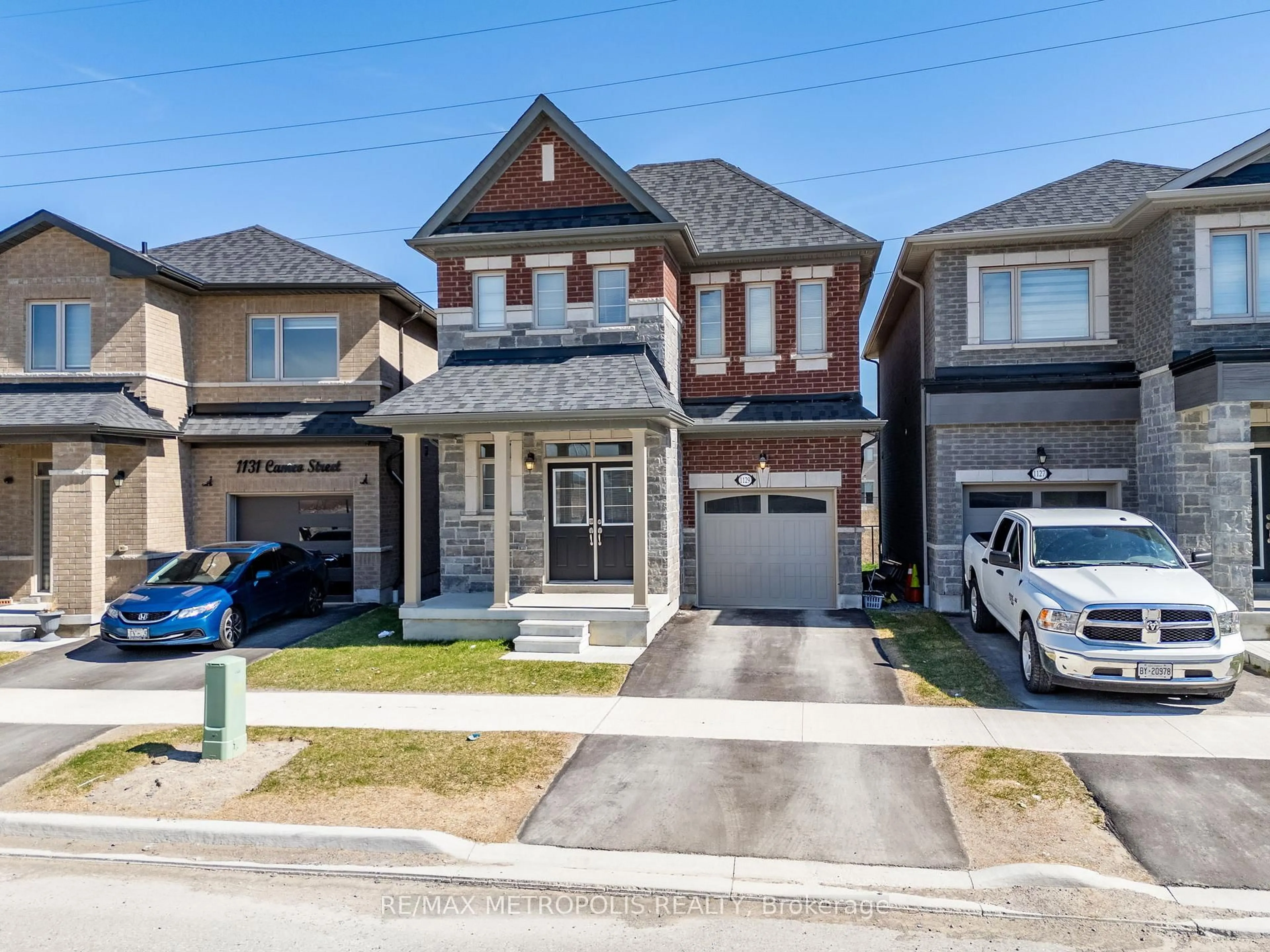Home with brick exterior material, street for 1129 CAMEO St, Pickering Ontario L1X 0L7