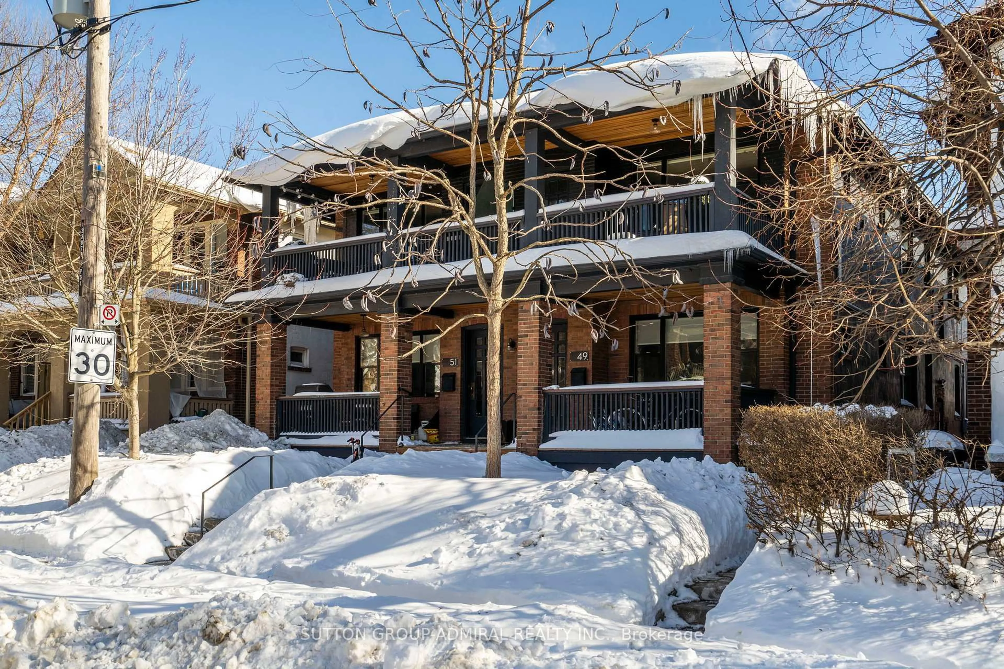 Home with brick exterior material, street for 49 & 51 Wineva Ave, Toronto Ontario M4E 2T1