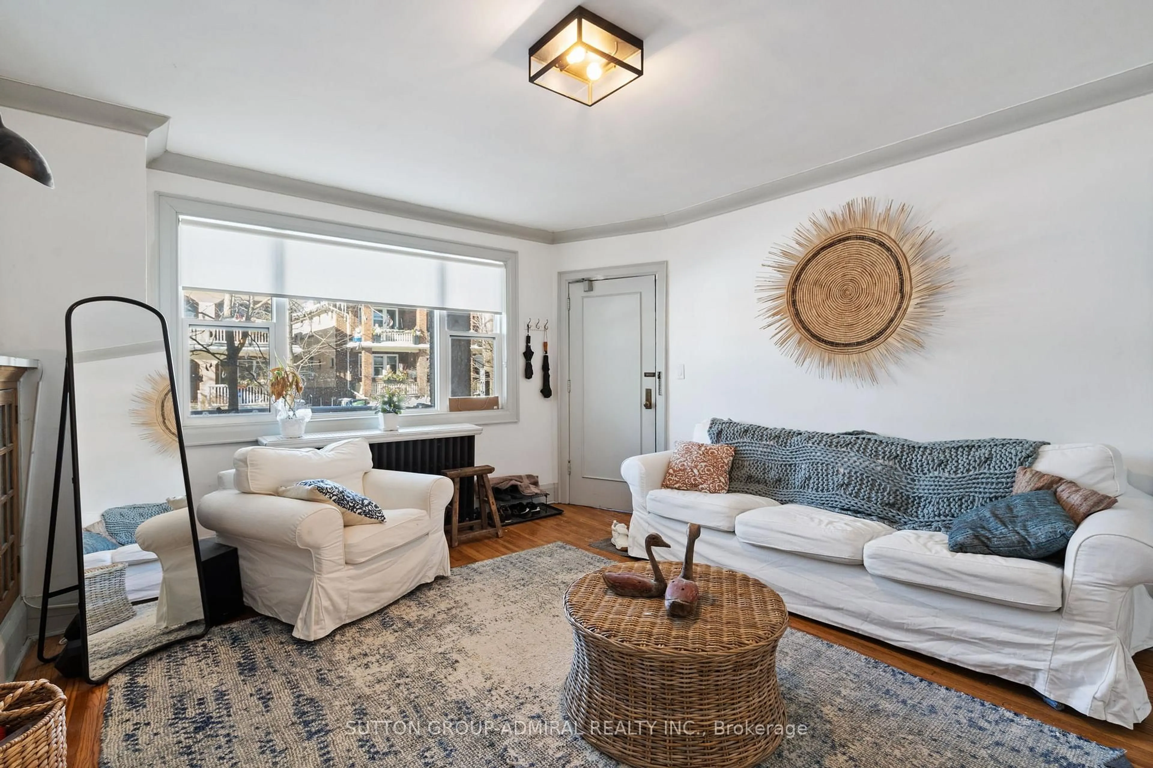 Living room with furniture, unknown for 49 & 51 Wineva Ave, Toronto Ontario M4E 2T1