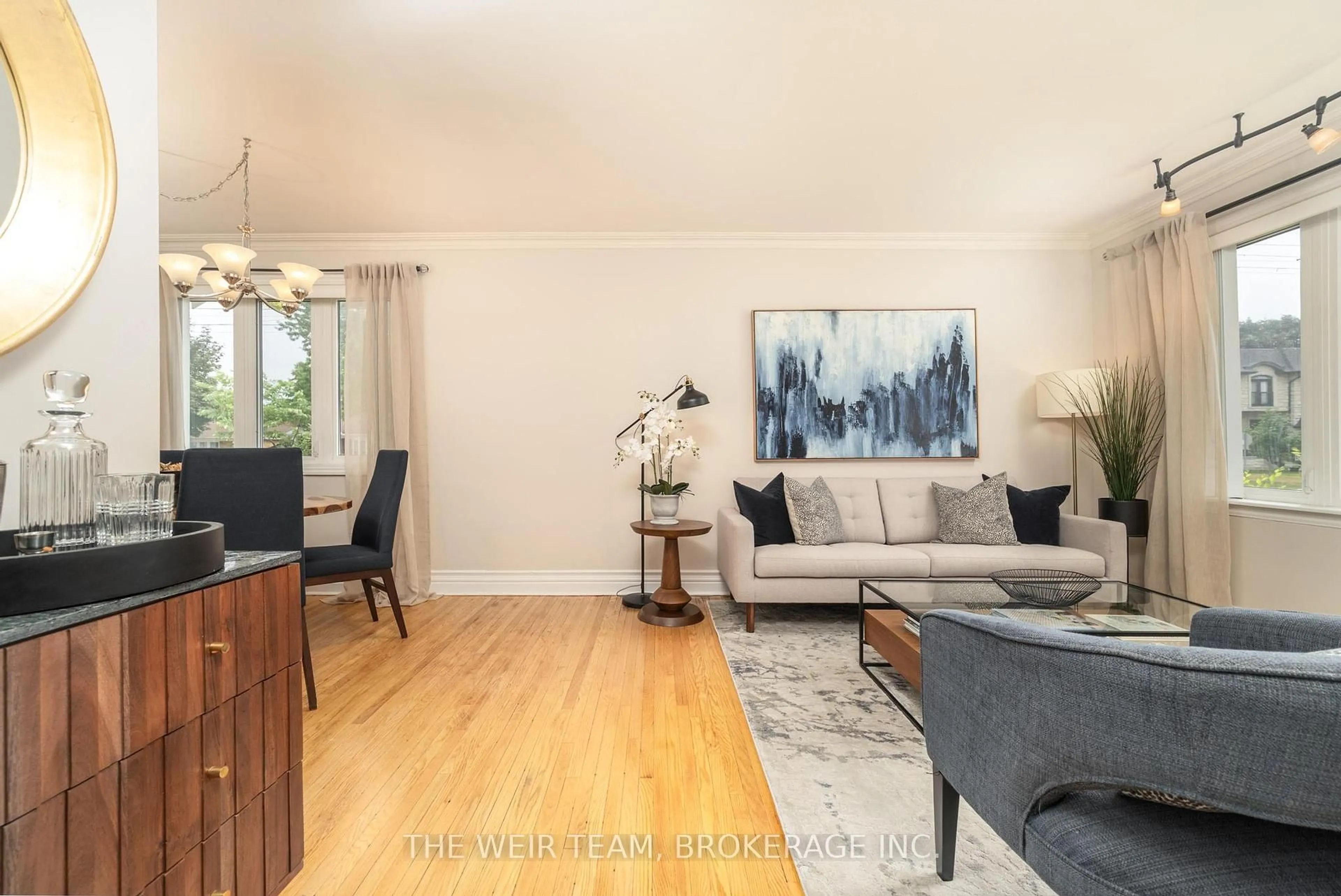 Living room with furniture, wood/laminate floor for 3 Archwood Cres, Toronto Ontario M1R 3L8