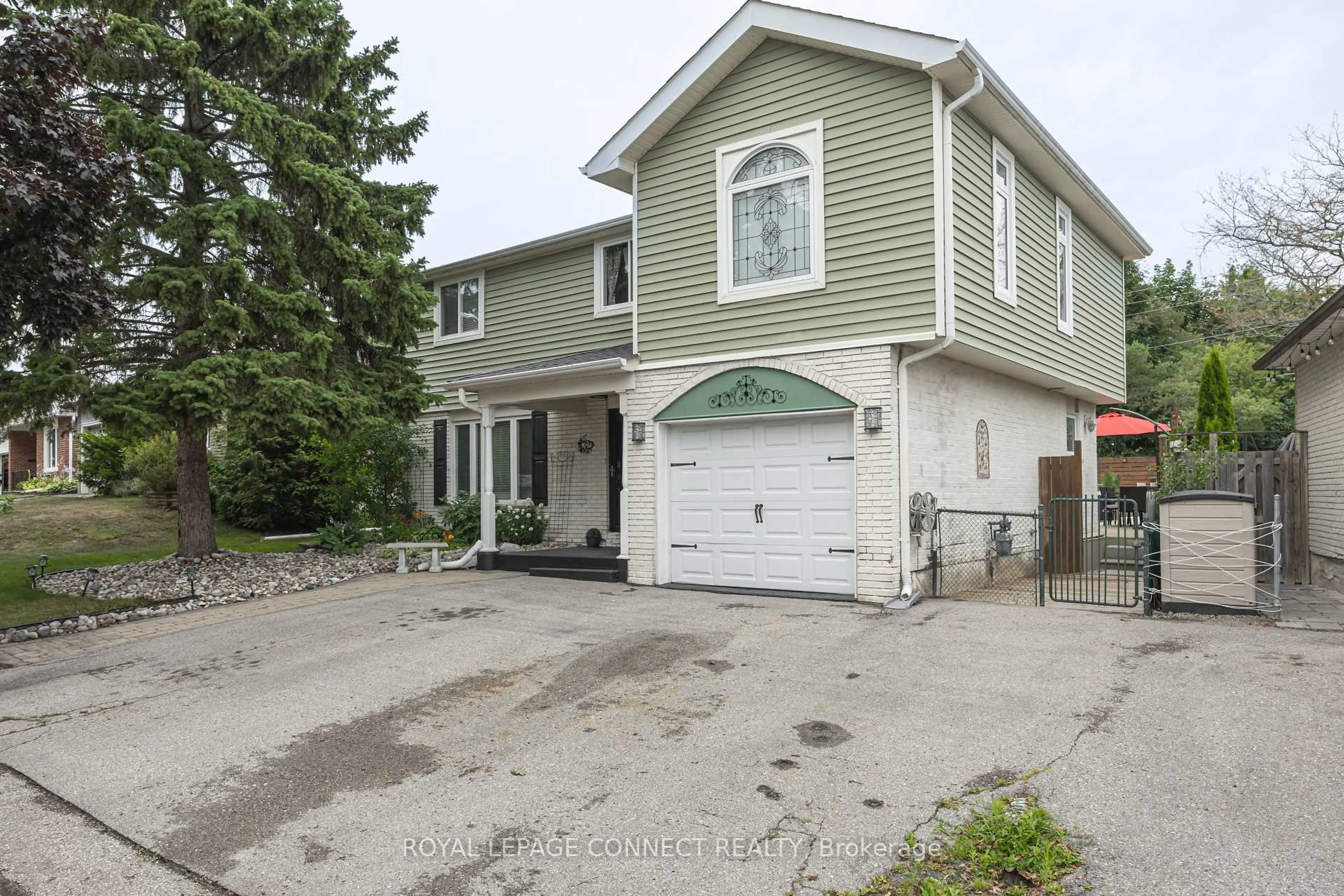 Home with vinyl exterior material, street for 32 Harland Cres, Ajax Ontario L1S 1J9