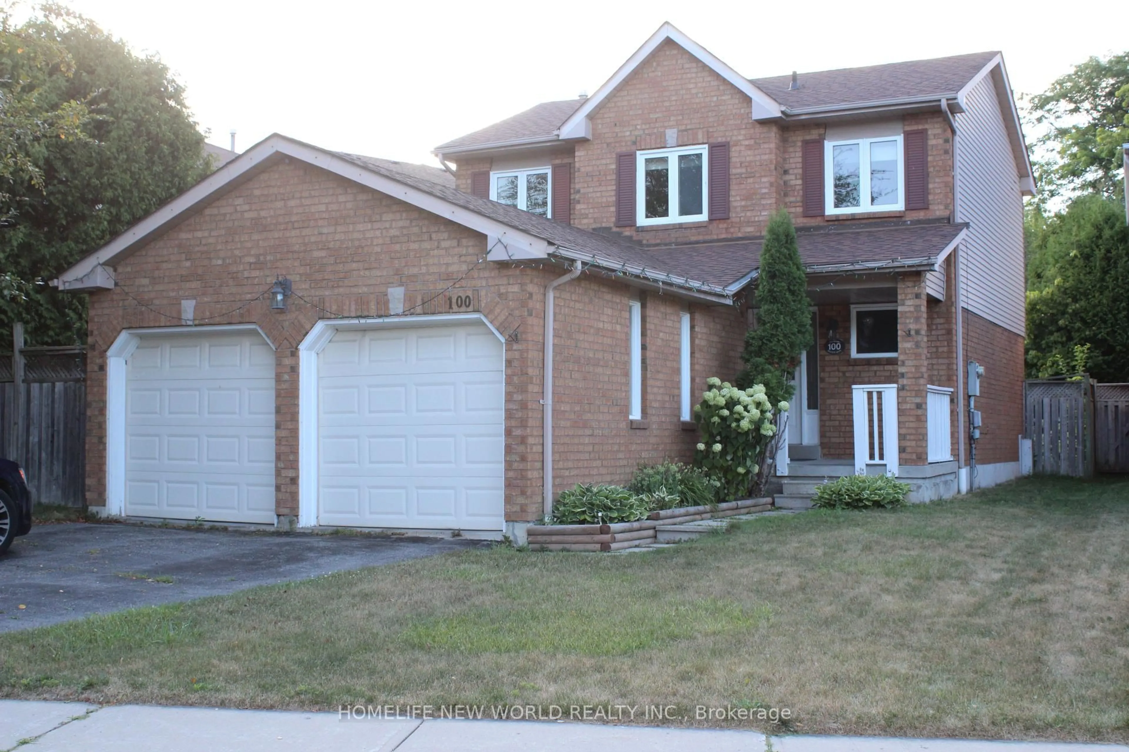 Home with brick exterior material, street for 100 Bassett Blvd, Whitby Ontario L1N 8X3