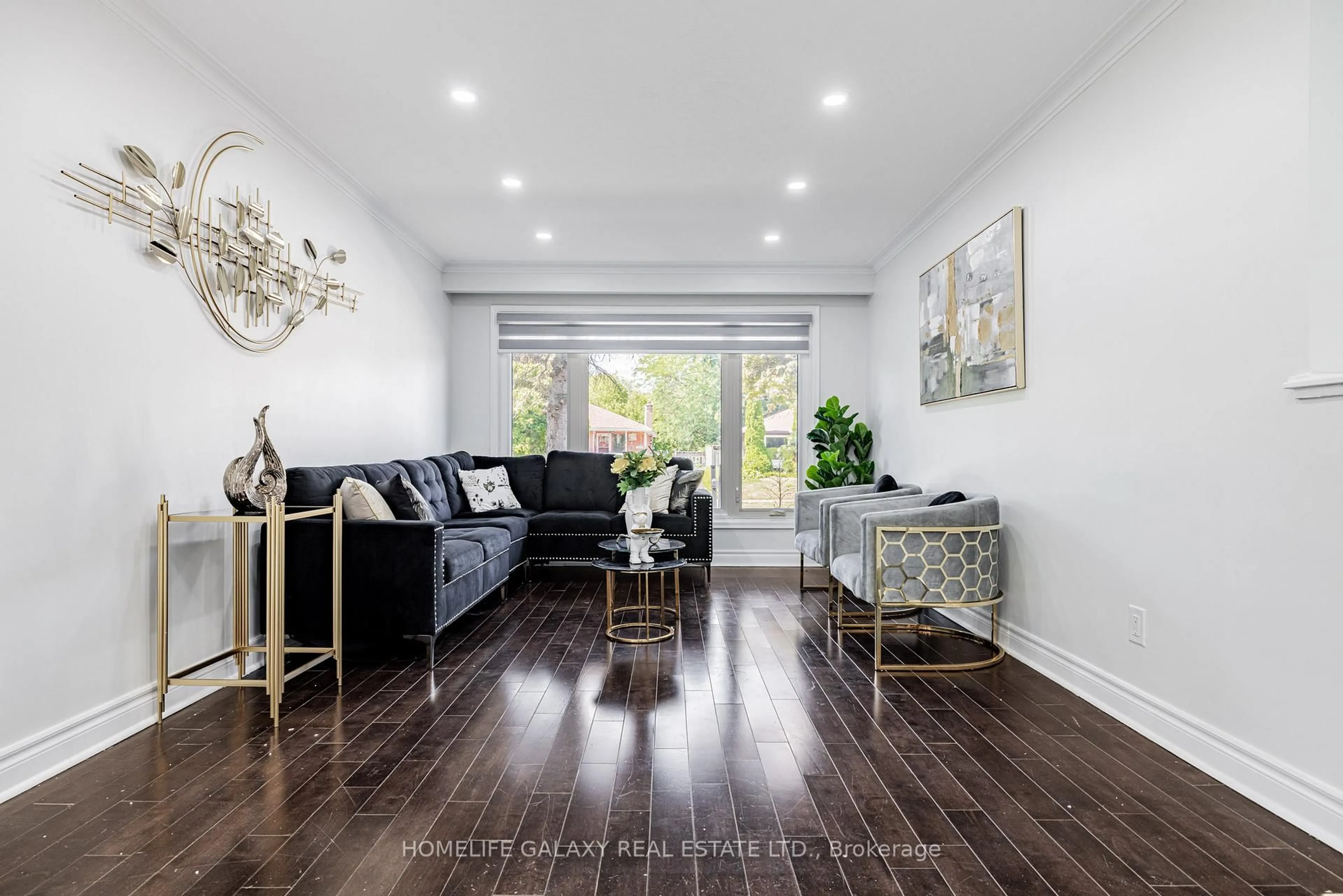 Living room with furniture, wood/laminate floor for 133 Lupin Dr, Whitby Ontario L1N 1X9