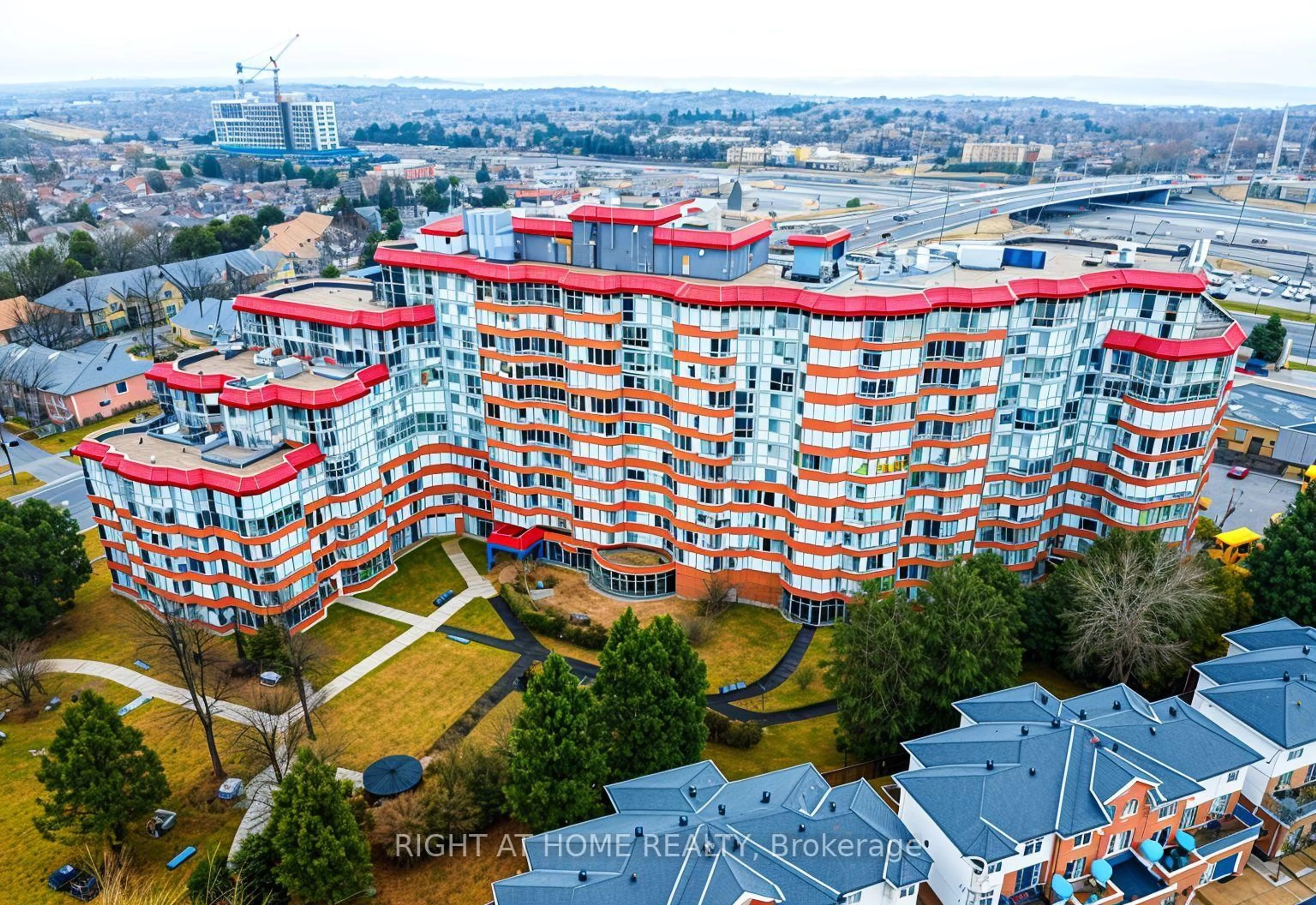 A pic from outside/outdoor area/front of a property/back of a property/a pic from drone, city buildings view from balcony for 11753 Sheppard Ave #1216, Toronto Ontario M1B 5M3