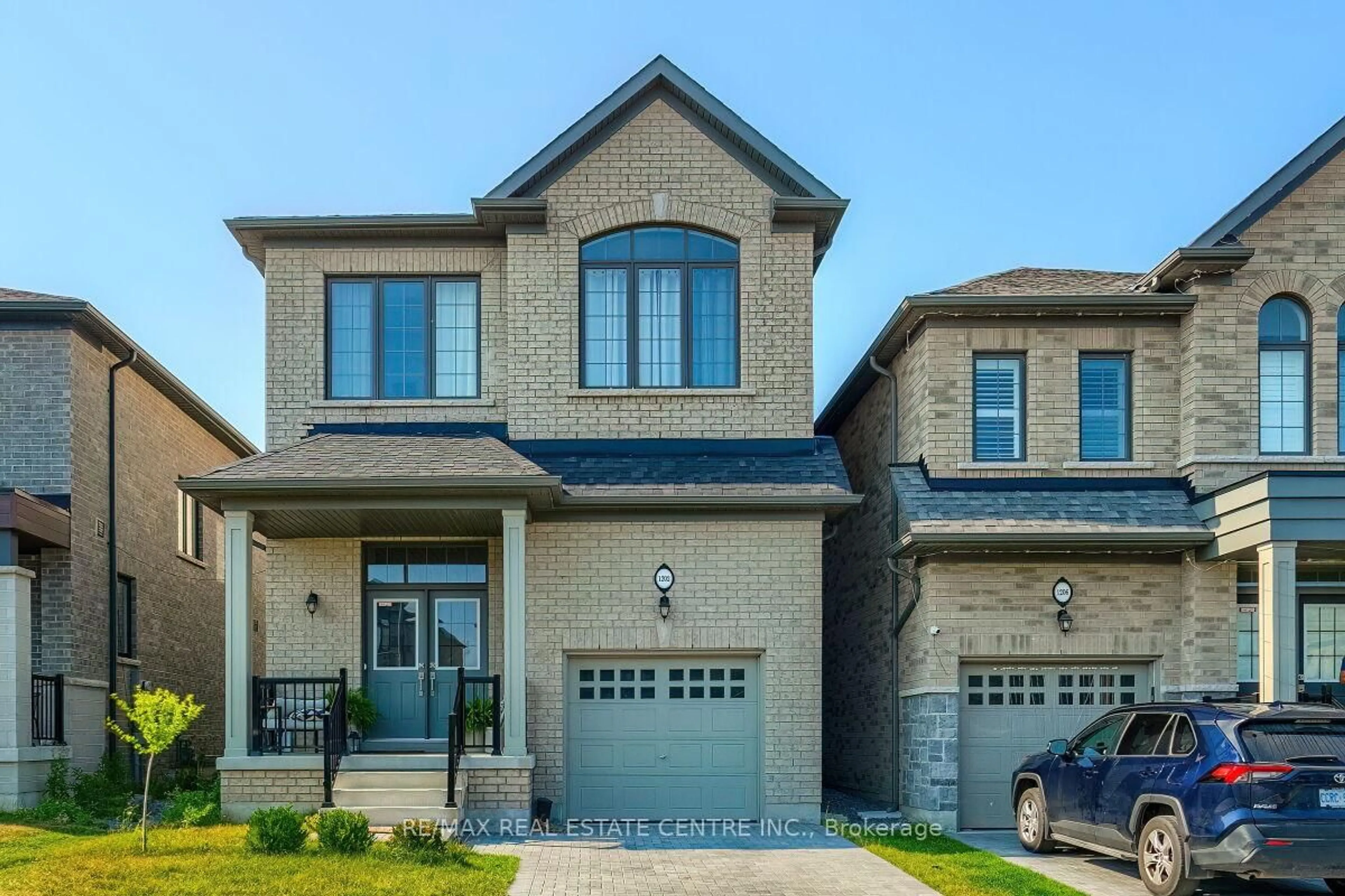 Home with brick exterior material, street for 1202 Rexton Dr, Oshawa Ontario L1L 0T4
