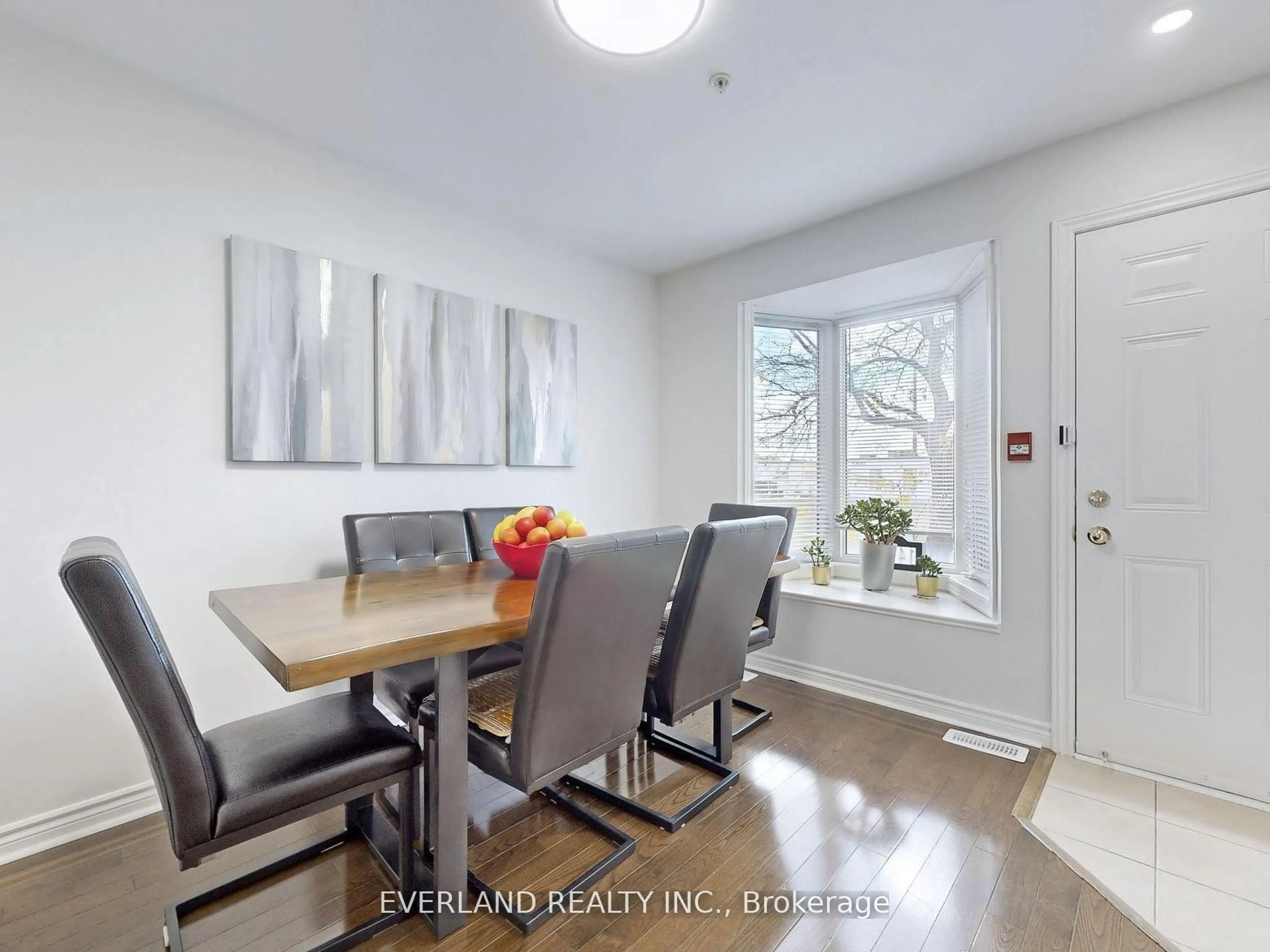 Dining room, wood/laminate floor for 1465 Birchmount Rd #C, Toronto Ontario M1P 2G4