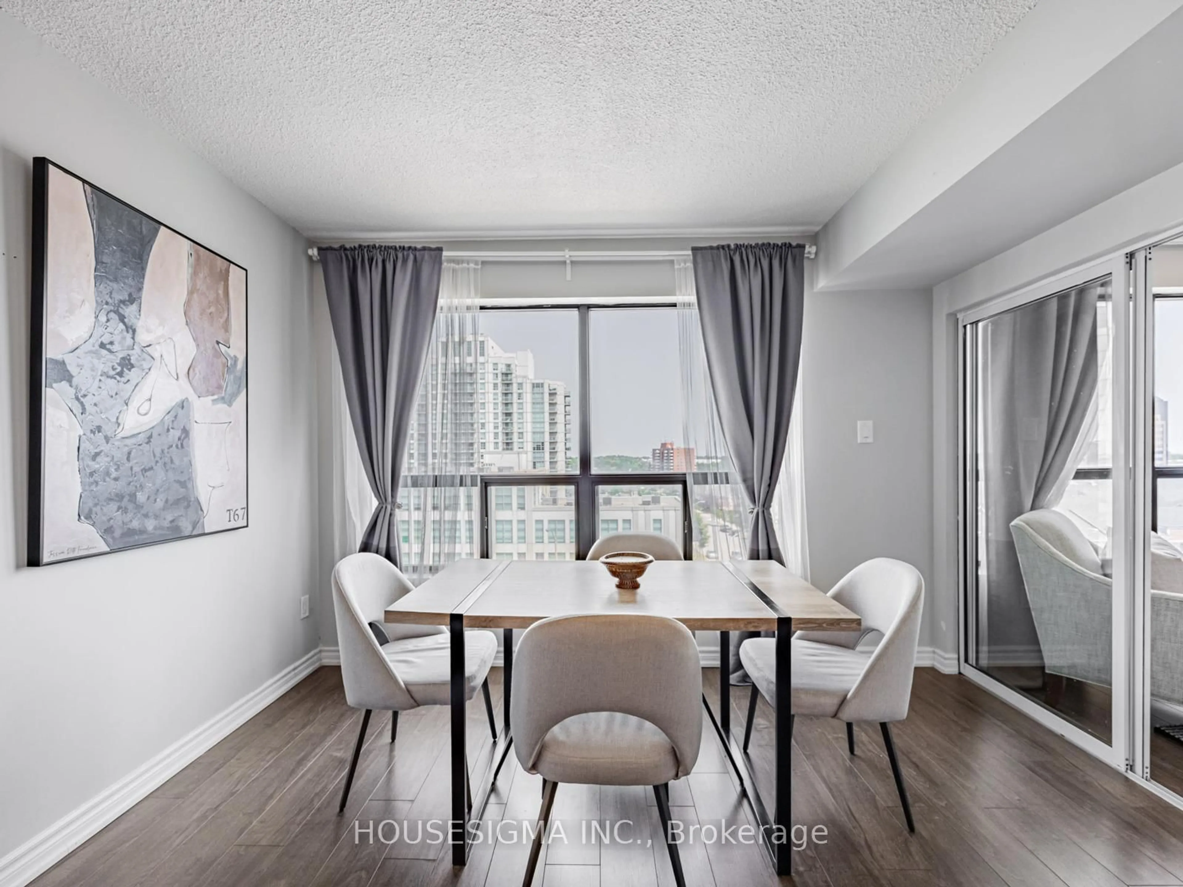 Dining room, wood/laminate floor for 39 Kimbercroft Crt #703, Toronto Ontario M1S 5B5