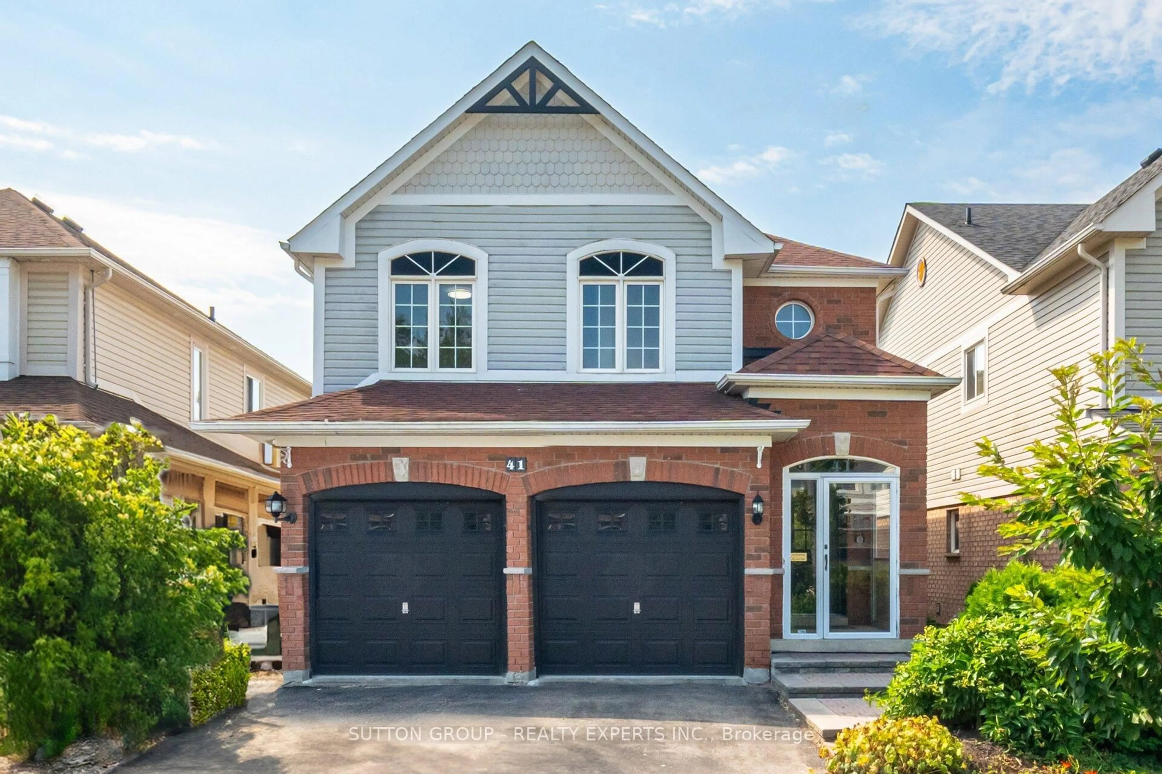 Home with brick exterior material, street for 41 Solmar Ave, Whitby Ontario L1R 2Z6
