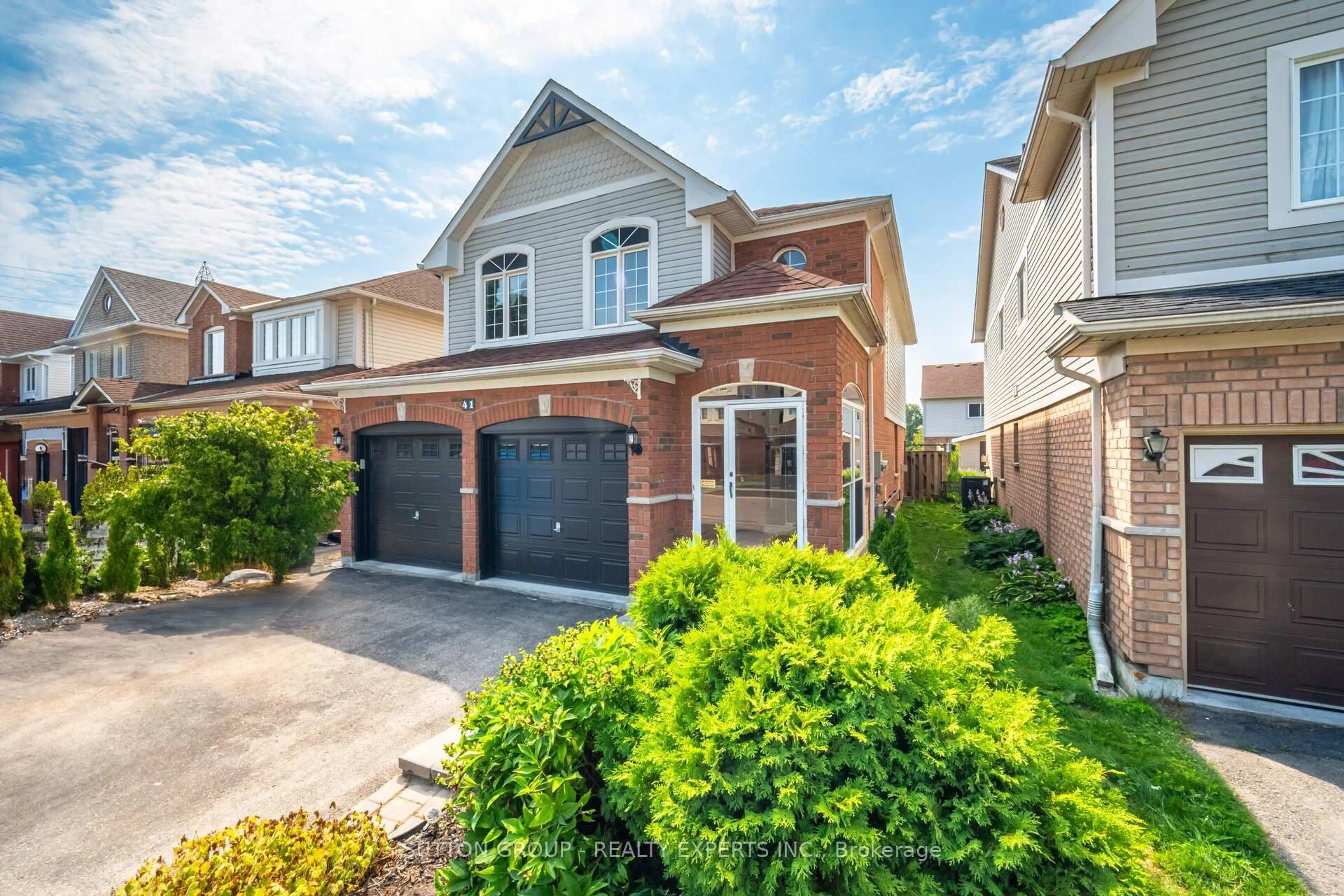Home with brick exterior material, street for 41 Solmar Ave, Whitby Ontario L1R 2Z6