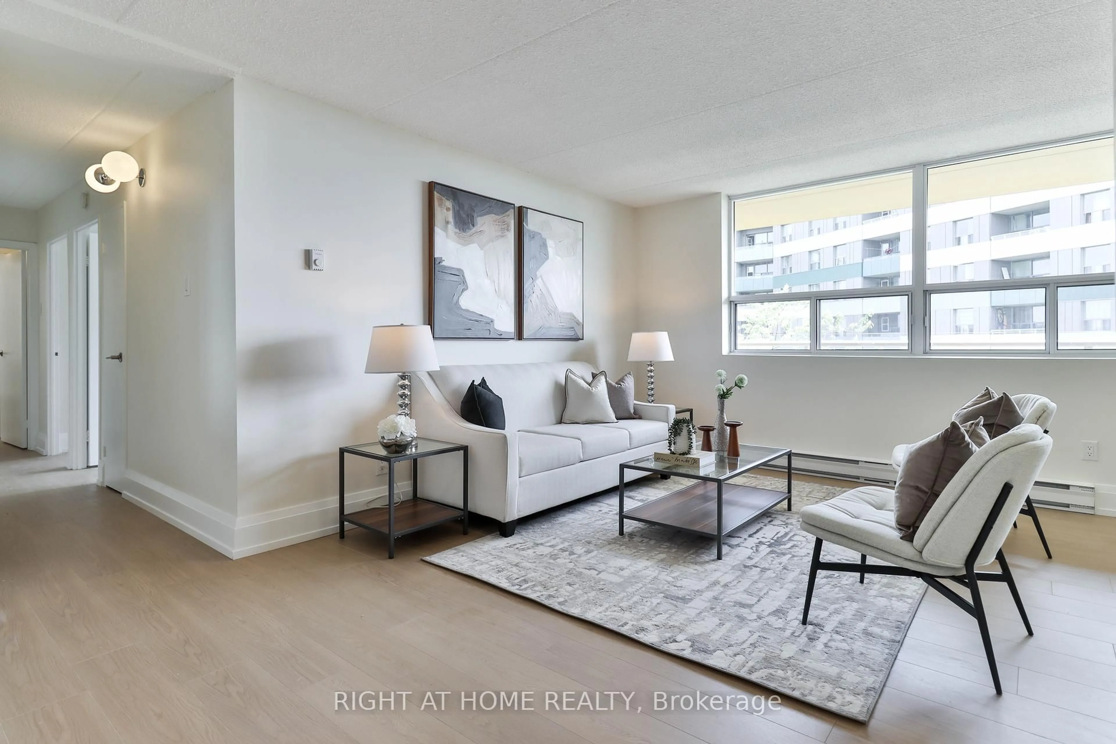 Living room with furniture, unknown for 207 Galloway Rd #701, Toronto Ontario M1E 4X3