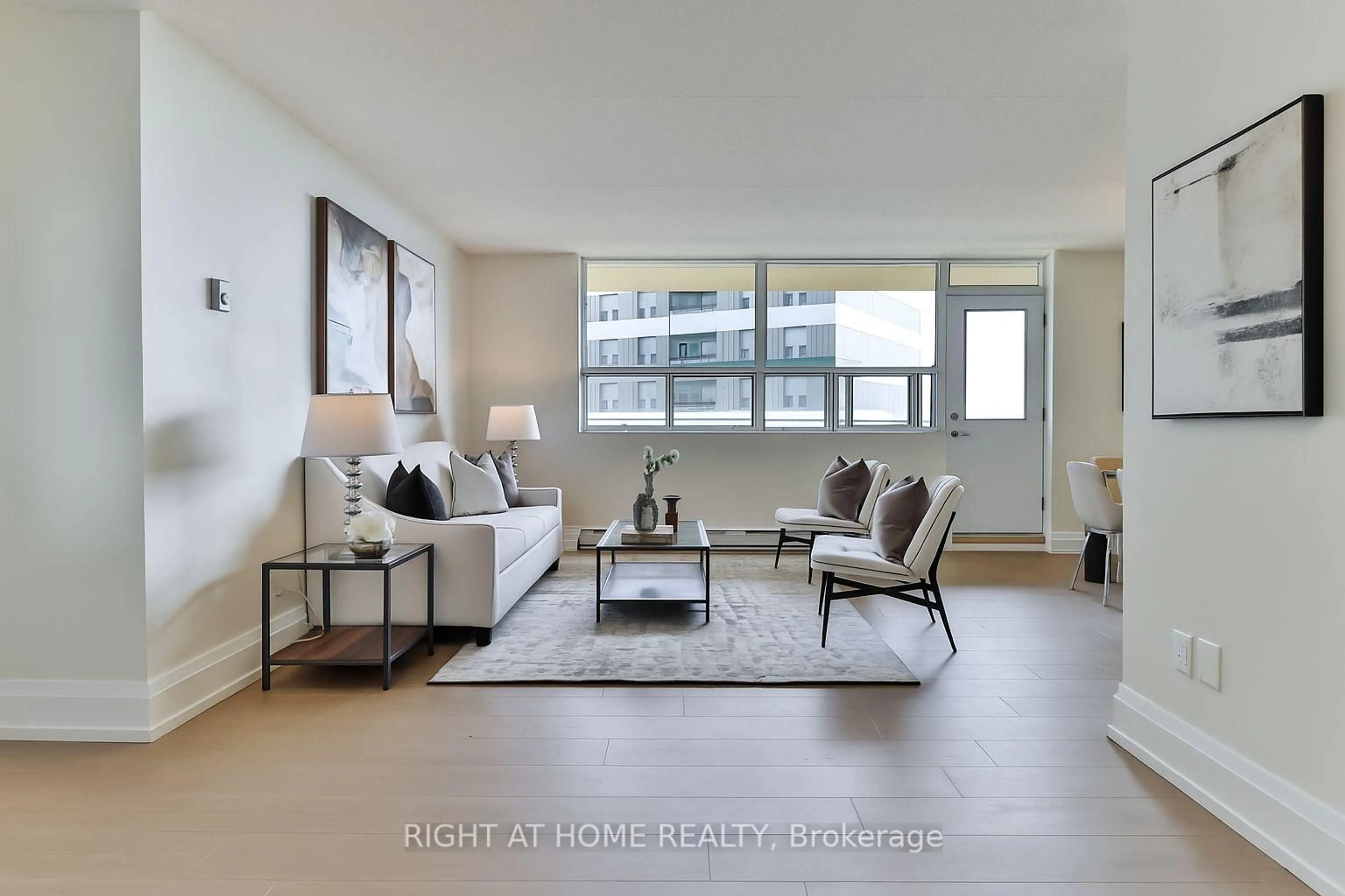 Living room with furniture, unknown for 207 Galloway Rd #701, Toronto Ontario M1E 4X3
