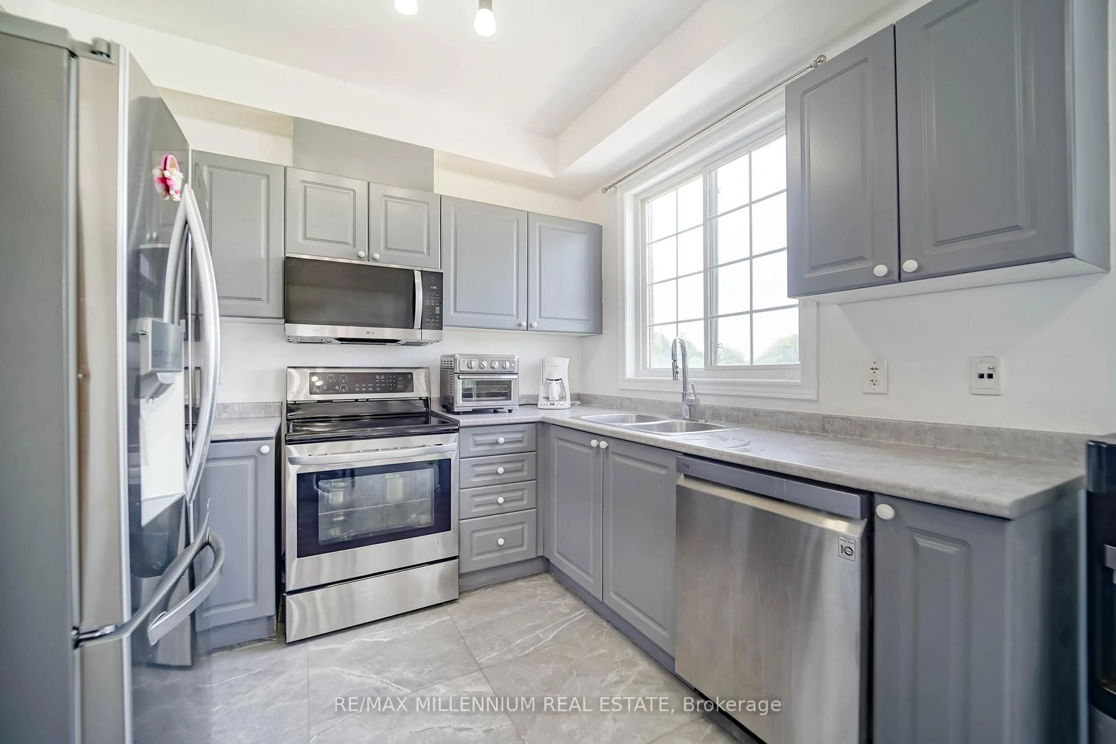 Open concept kitchen, ceramic/tile floor for 16 Boone Lane, Ajax Ontario L1S 7S3