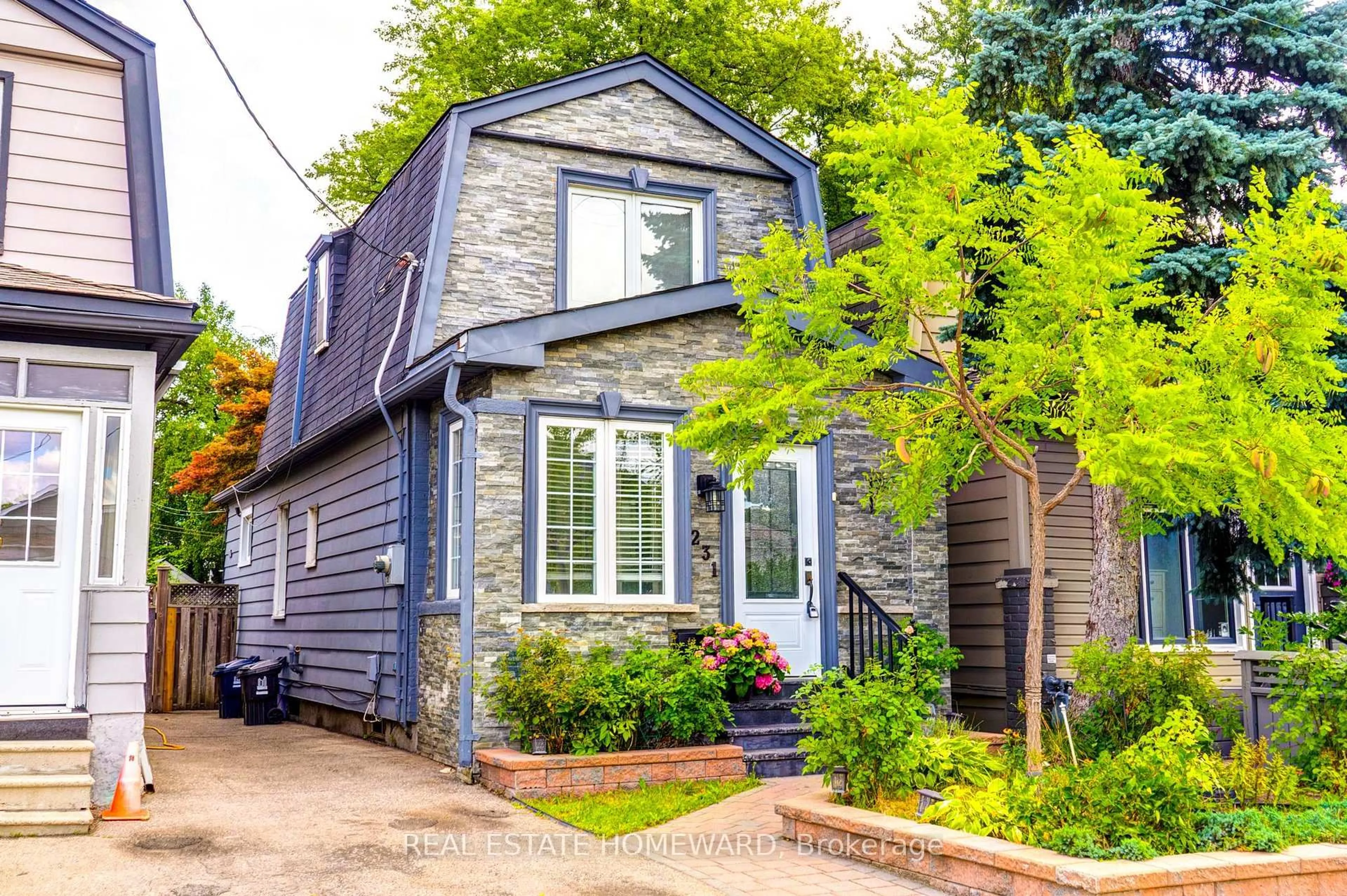 Home with brick exterior material, street for 231 Donlands Ave, Toronto Ontario M4J 3P9