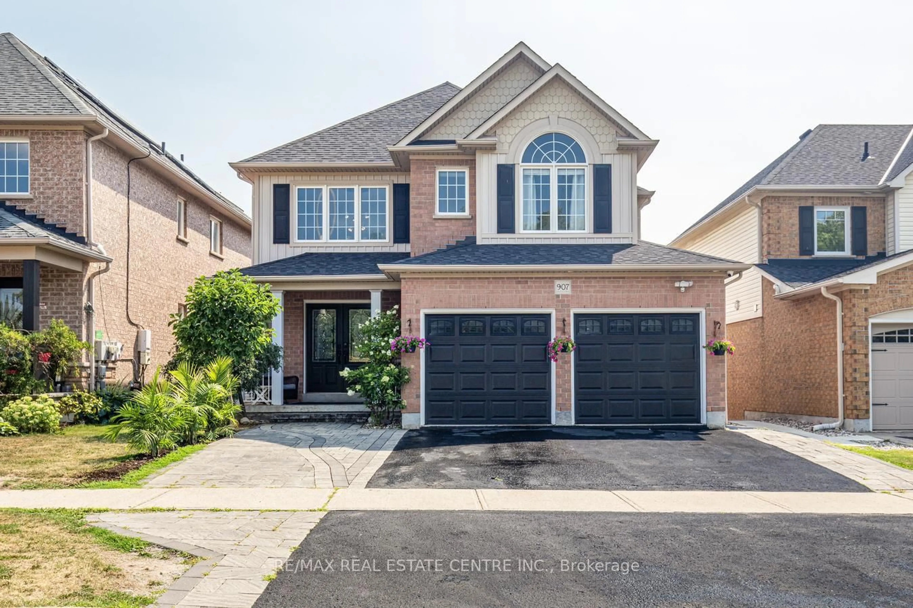 Home with brick exterior material, street for 907 Coldstream Dr, Oshawa Ontario L1K 2W8