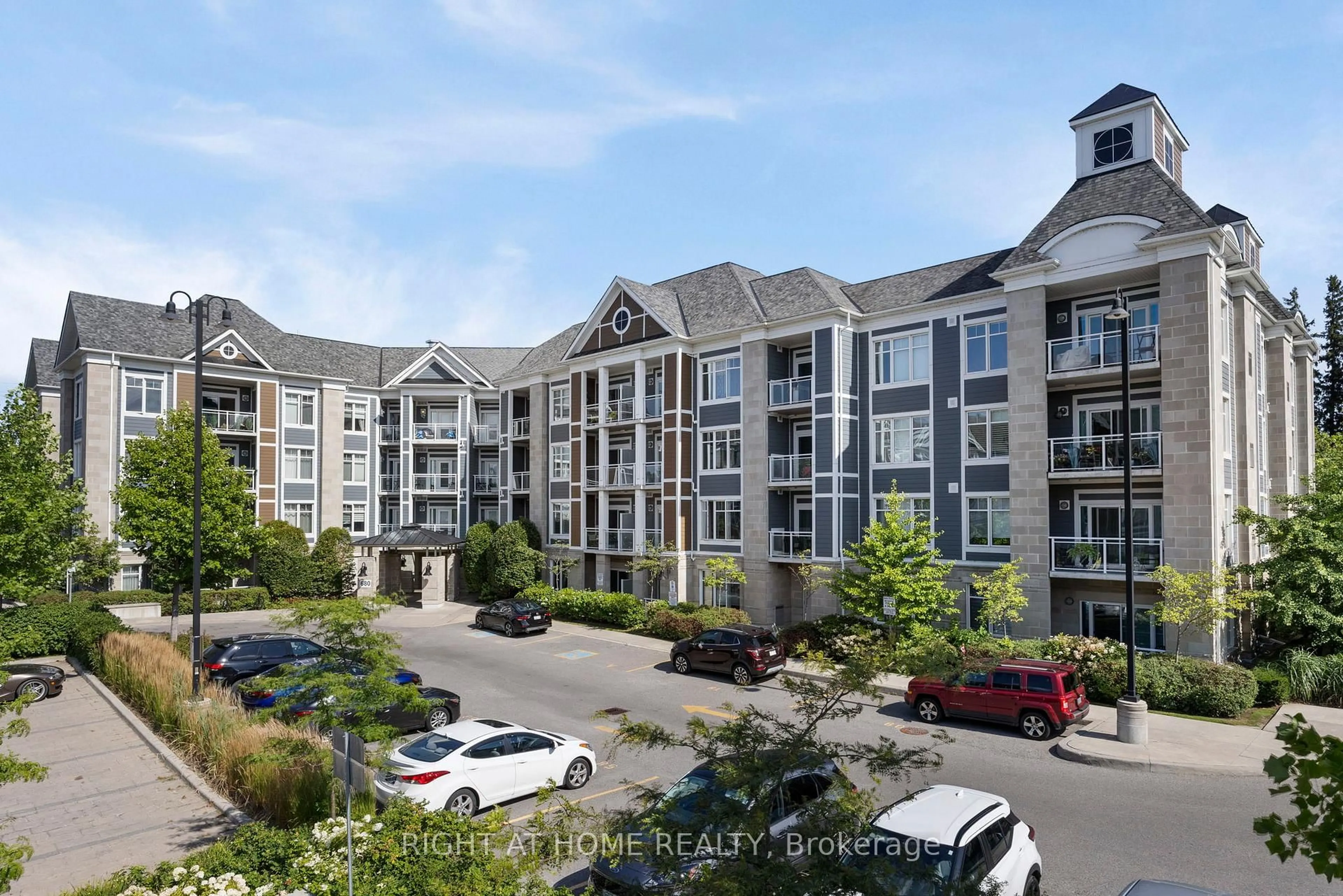 A pic from outside/outdoor area/front of a property/back of a property/a pic from drone, unknown for 680 Gordon St #412, Whitby Ontario L1N 0L2