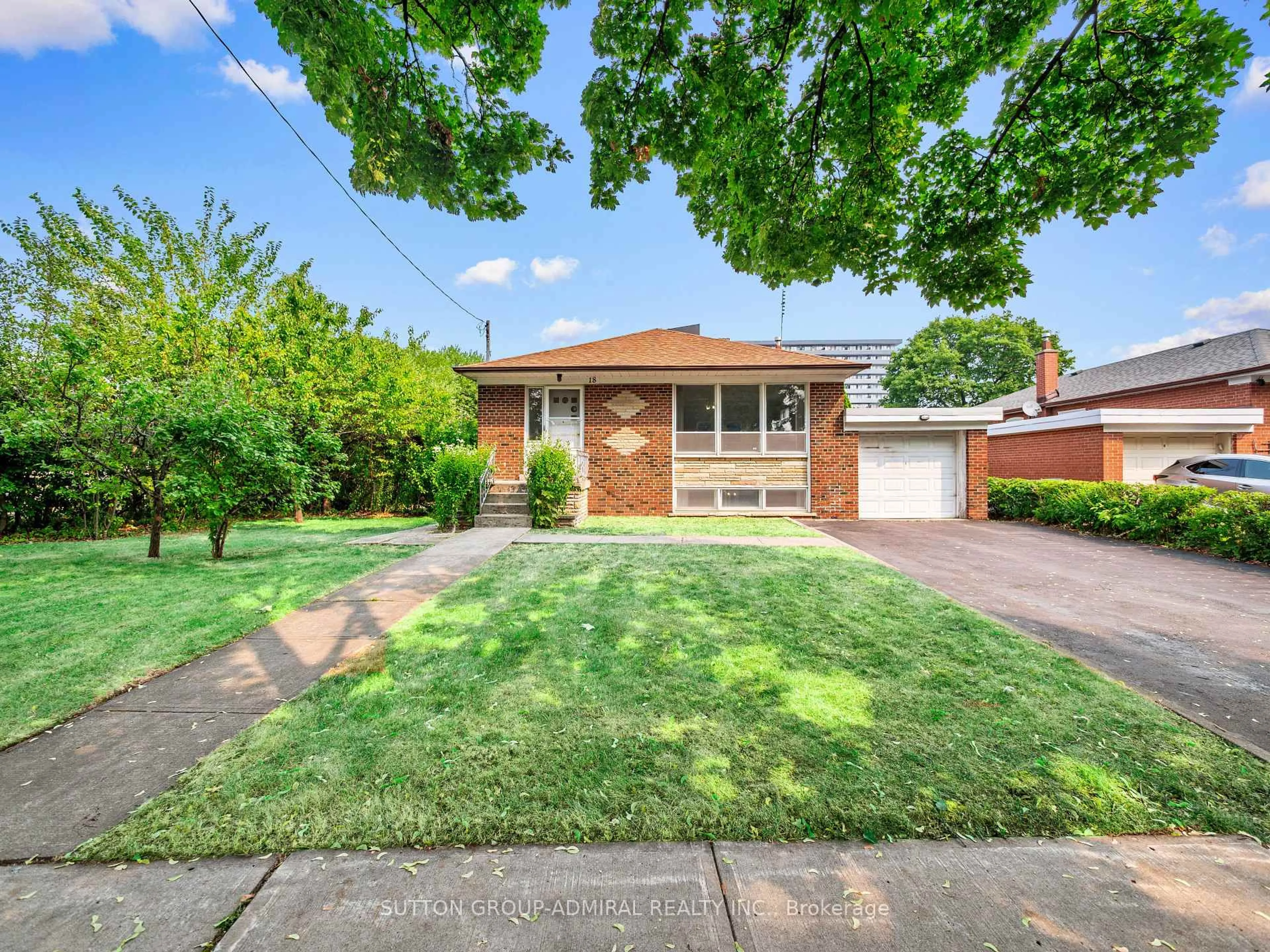 Home with brick exterior material, street for 18 Danube Dr, Toronto Ontario M1R 2A1