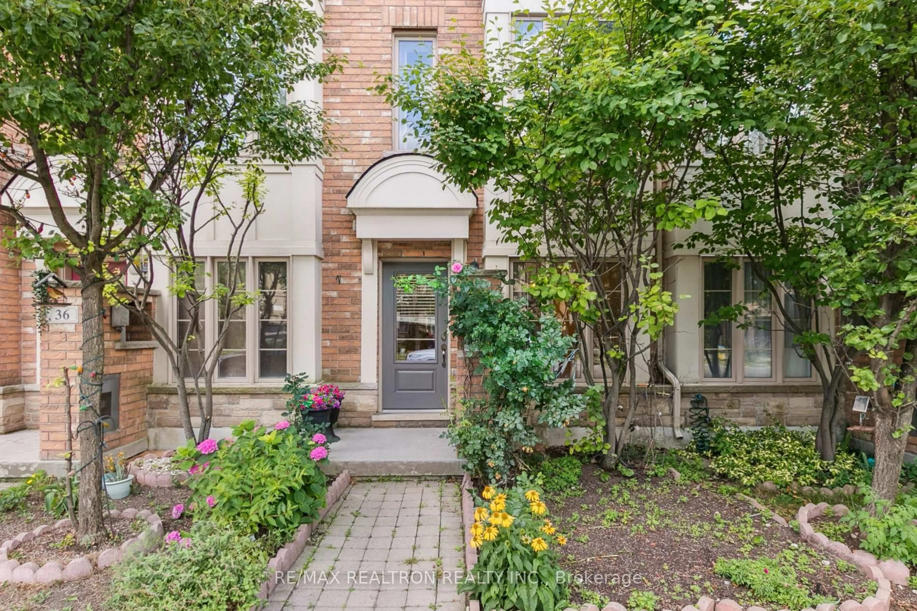 Home with brick exterior material, street for 38 Lily Cup Ave, Toronto Ontario M1L 0H4