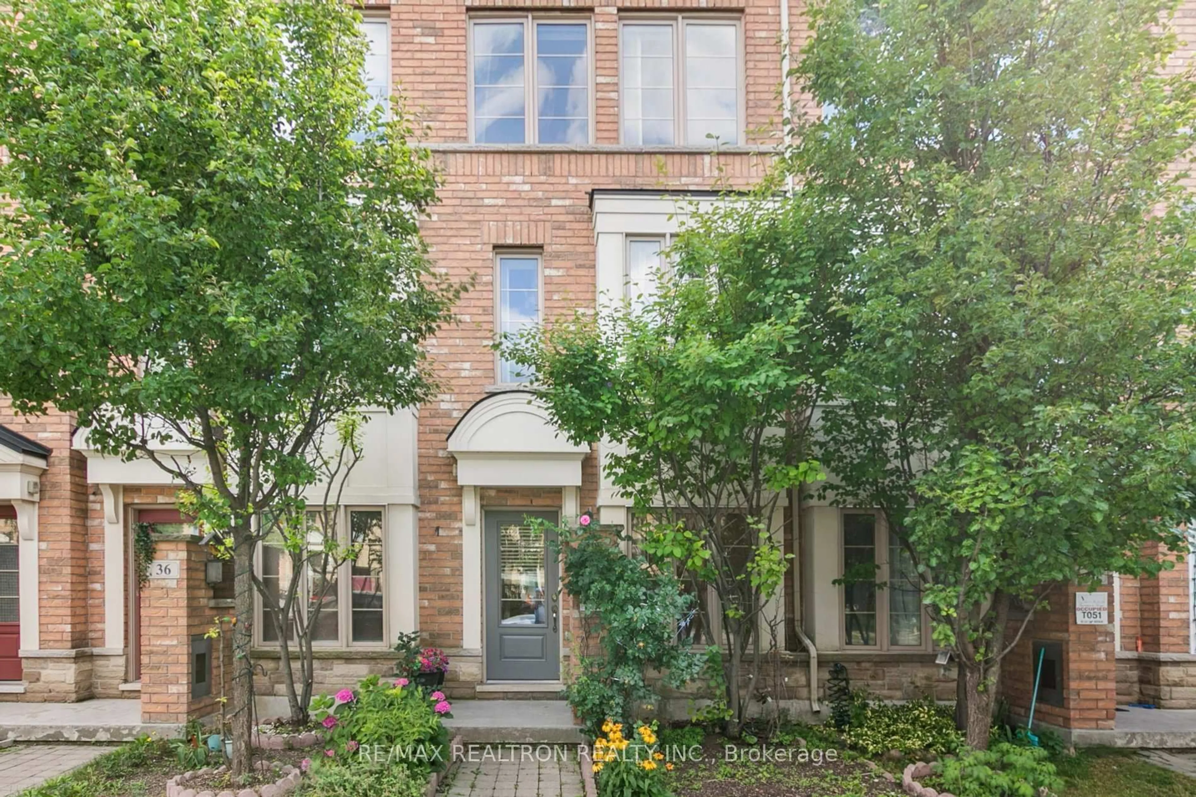 Home with brick exterior material, street for 38 Lily Cup Ave, Toronto Ontario M1L 0H4