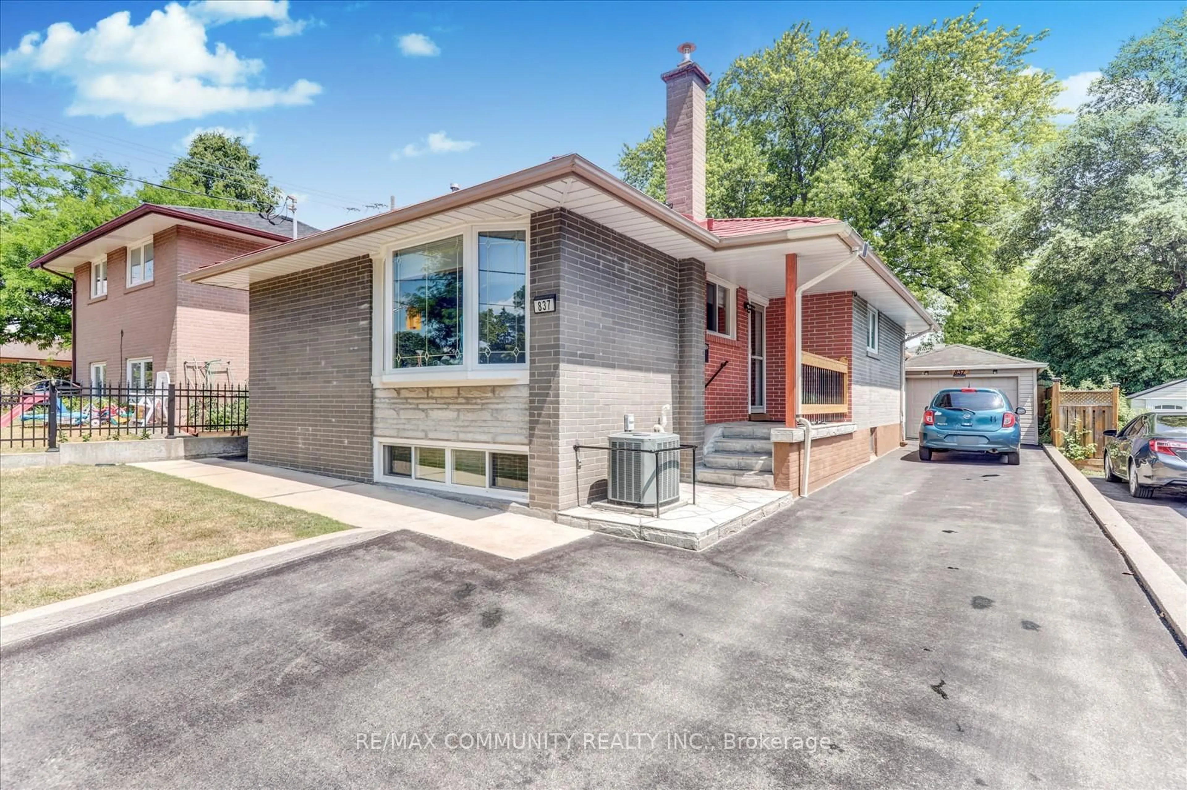Home with brick exterior material, street for 837 Scarborough Golf Club Rd, Toronto Ontario M1G 1J2