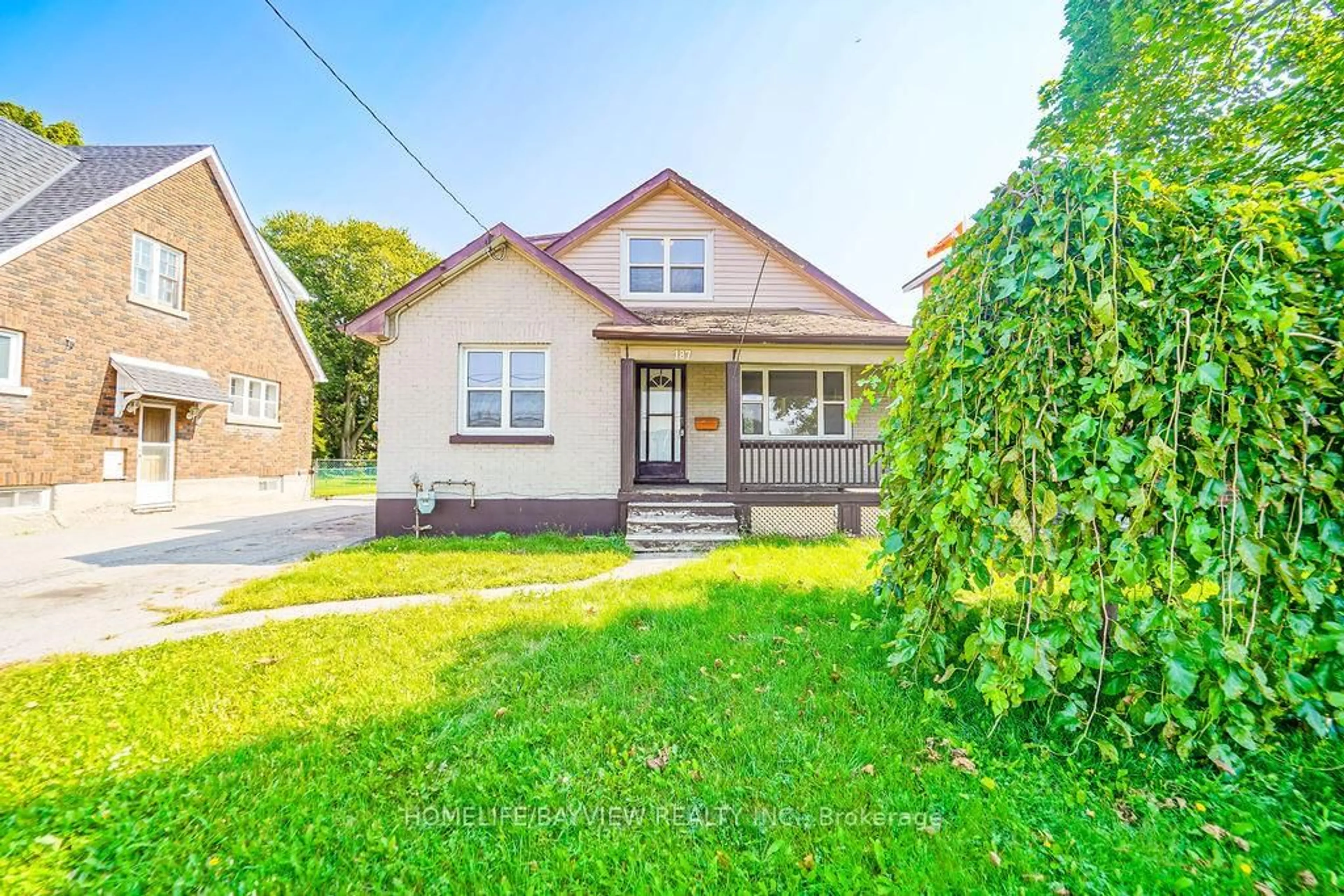 Home with brick exterior material, street for 187 Park Rd, Oshawa Ontario L1J 4H1