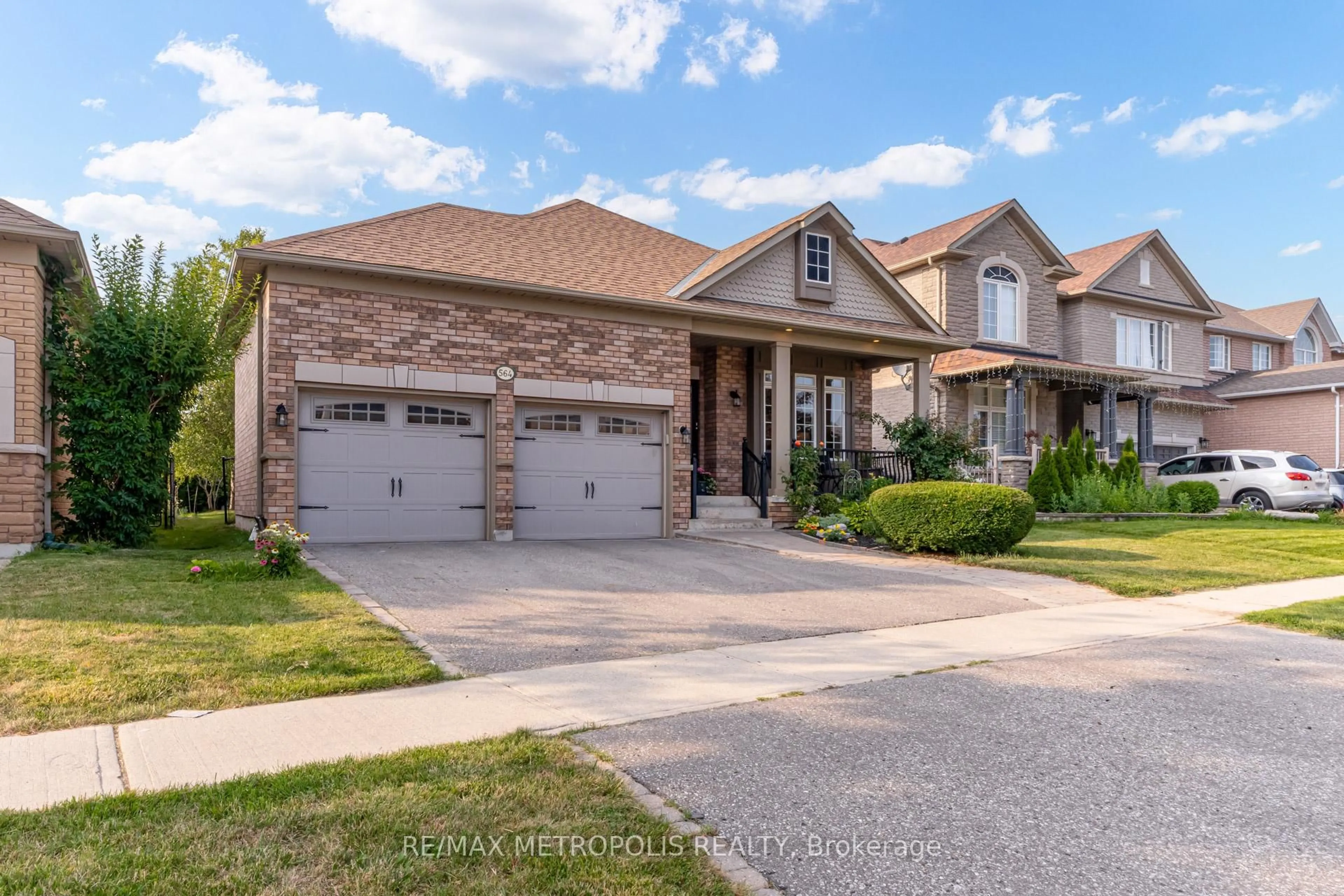 Home with brick exterior material, street for 564 Blackwood Blvd, Oshawa Ontario L1K 2N6